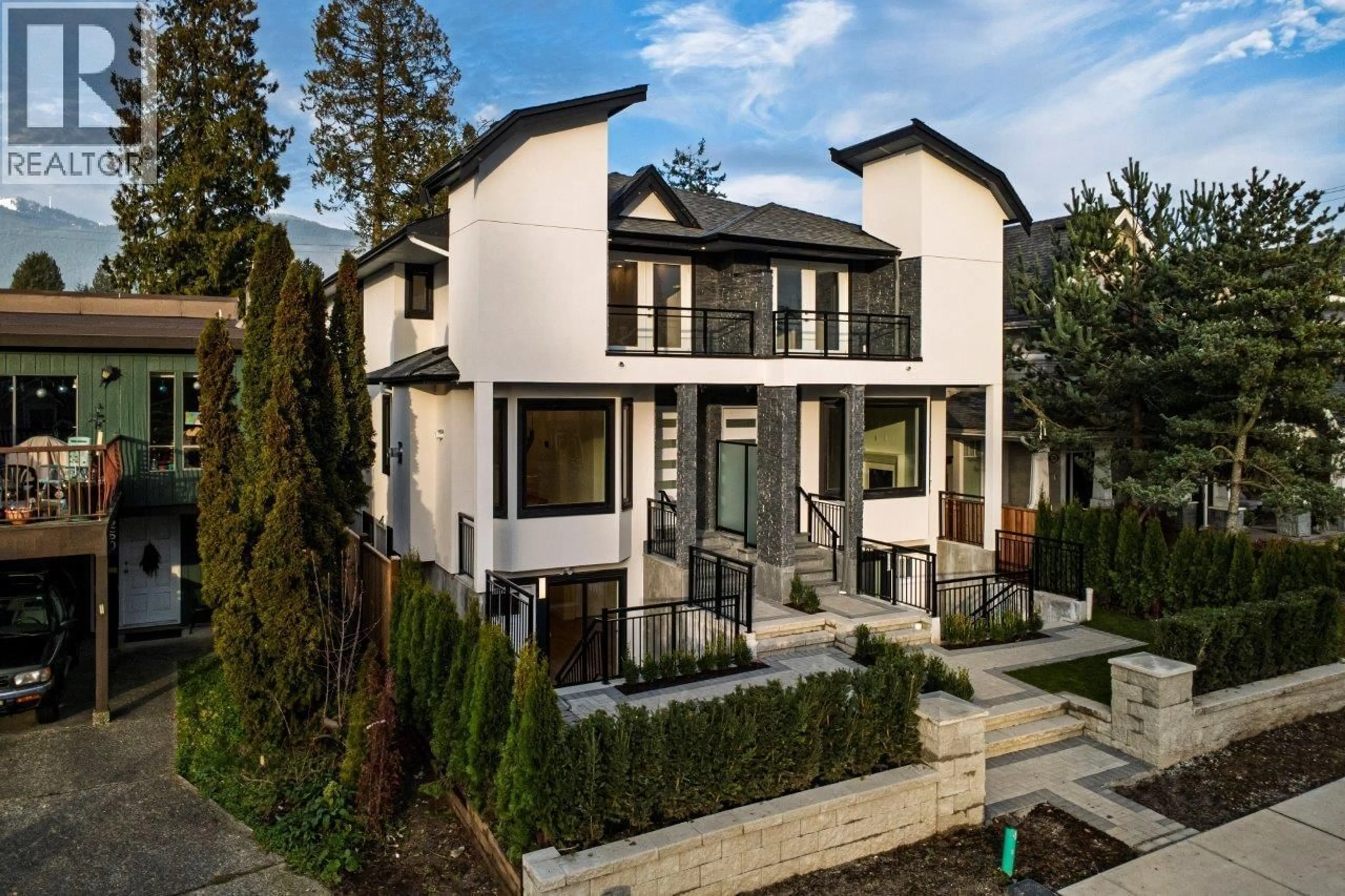 Home with brick exterior material, street for 254 18TH STREET, North Vancouver British Columbia V7L2X6