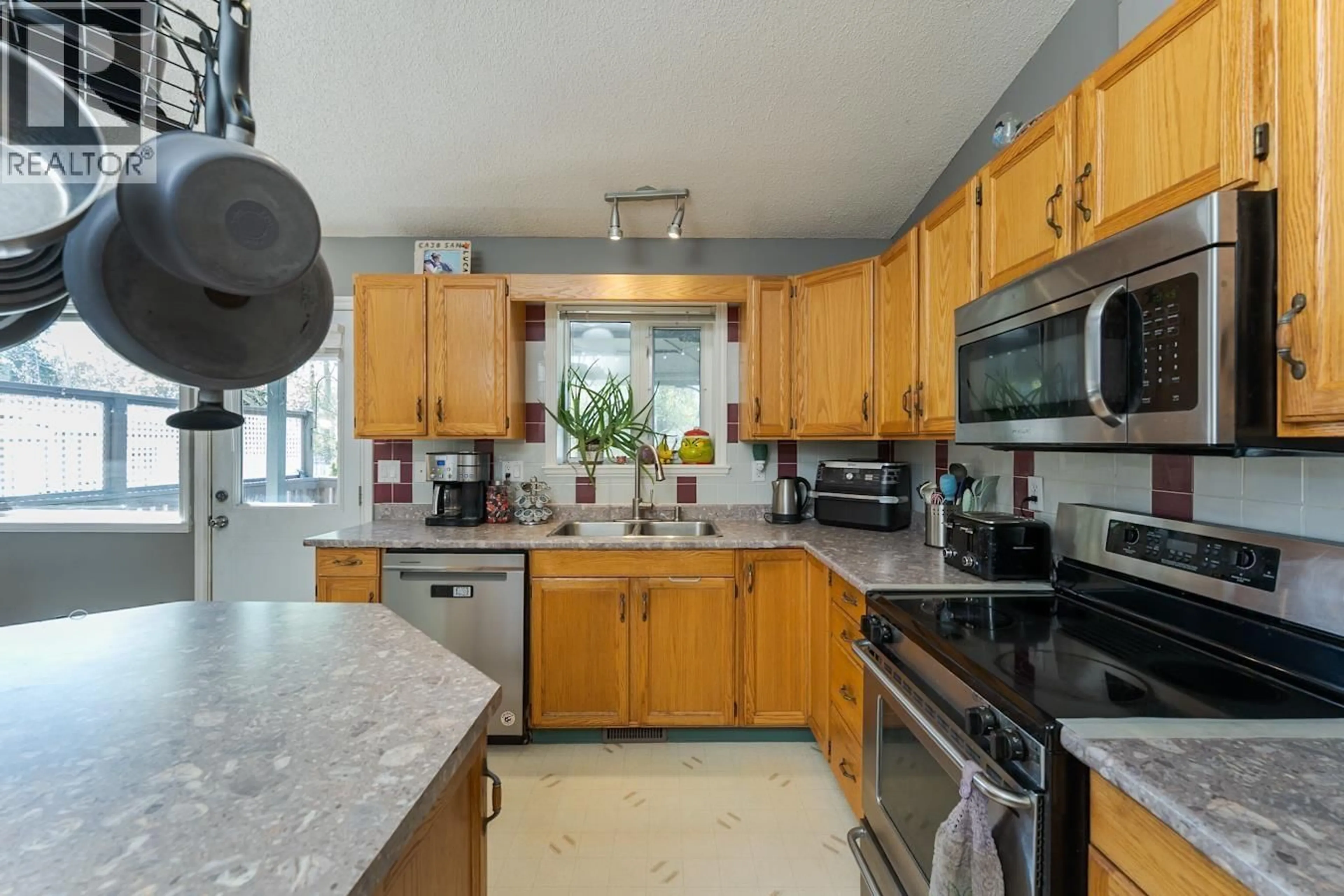 Standard kitchen, ceramic/tile floor for 1467 VILLAGE AVENUE, Prince George British Columbia V2L5P3