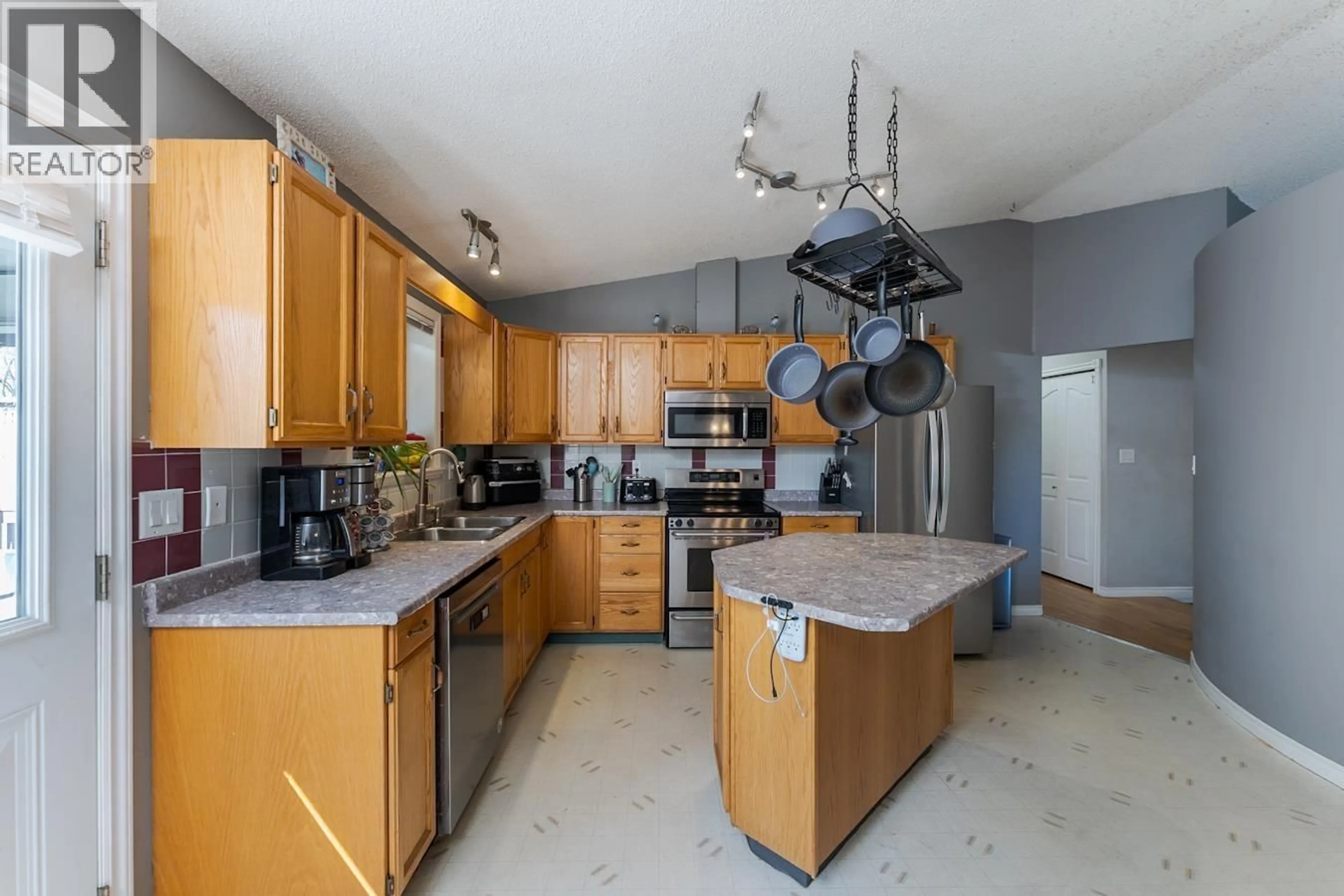 Open concept kitchen, ceramic/tile floor for 1467 VILLAGE AVENUE, Prince George British Columbia V2L5P3