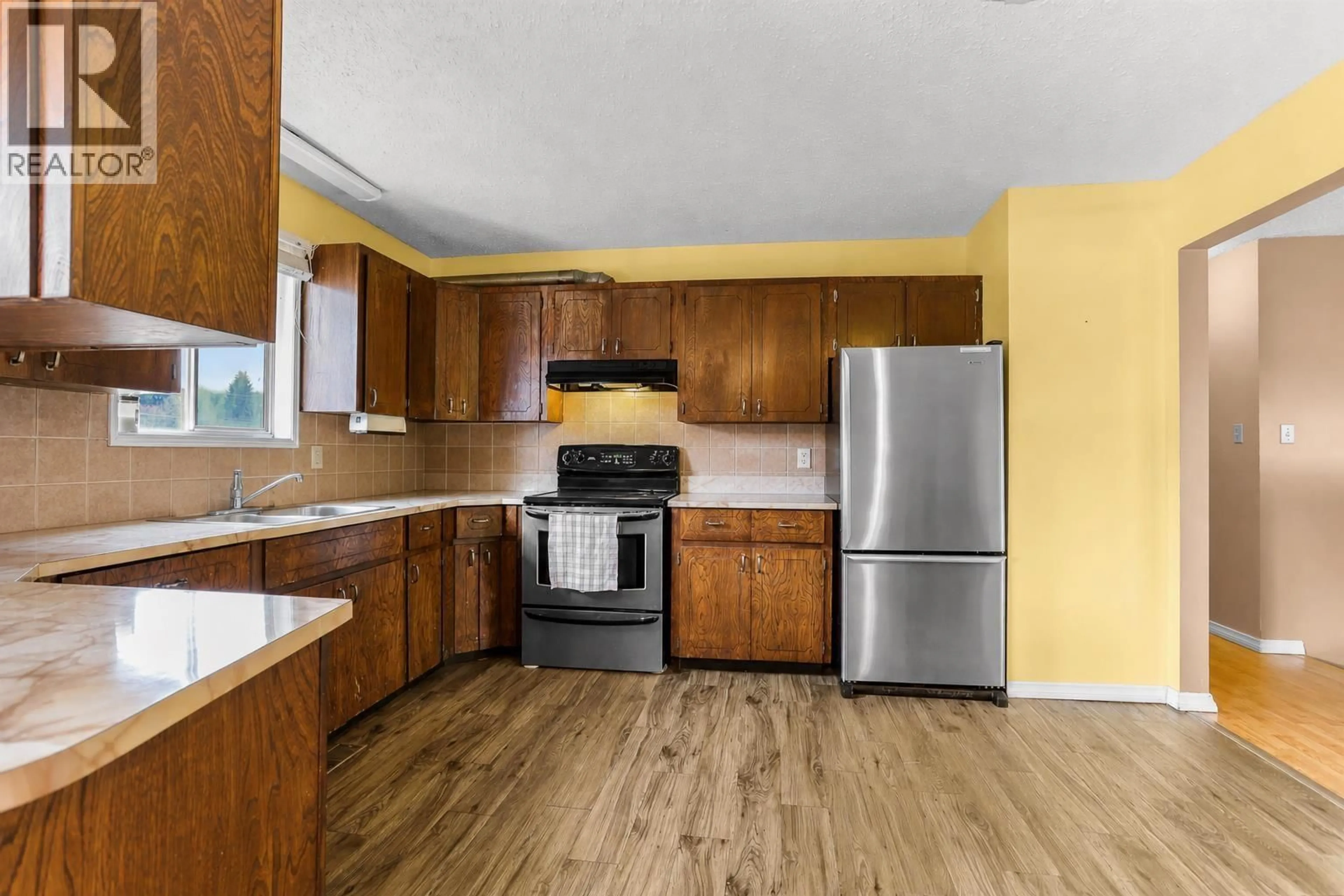 Standard kitchen, wood/laminate floor for 5 DEASE STREET, Kitimat British Columbia V8C2M2