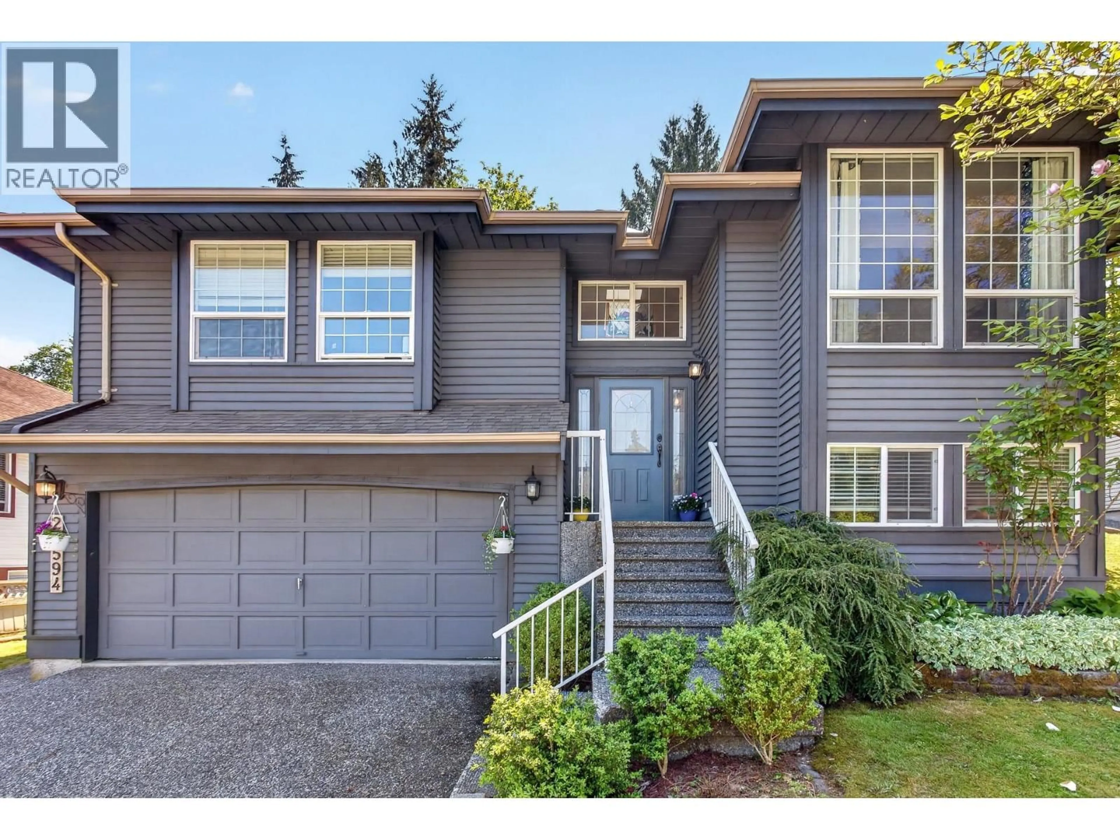 Home with vinyl exterior material, street for 23594 108 AVENUE, Maple Ridge British Columbia V2W1B1