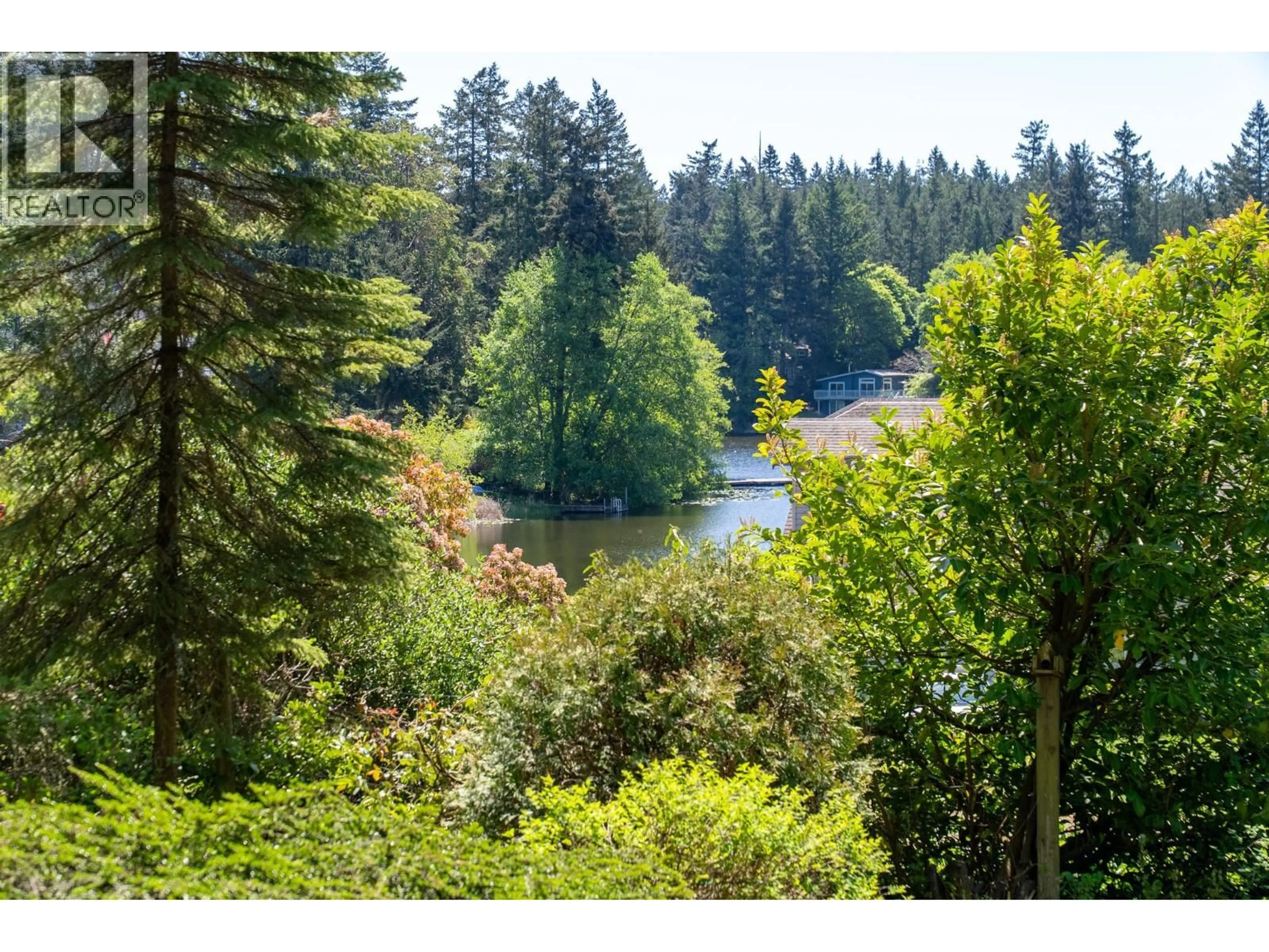 A pic from outside/outdoor area/front of a property/back of a property/a pic from drone, water/lake/river/ocean view for 37267 SCHOONER WAY, Pender Island British Columbia V0N2M2
