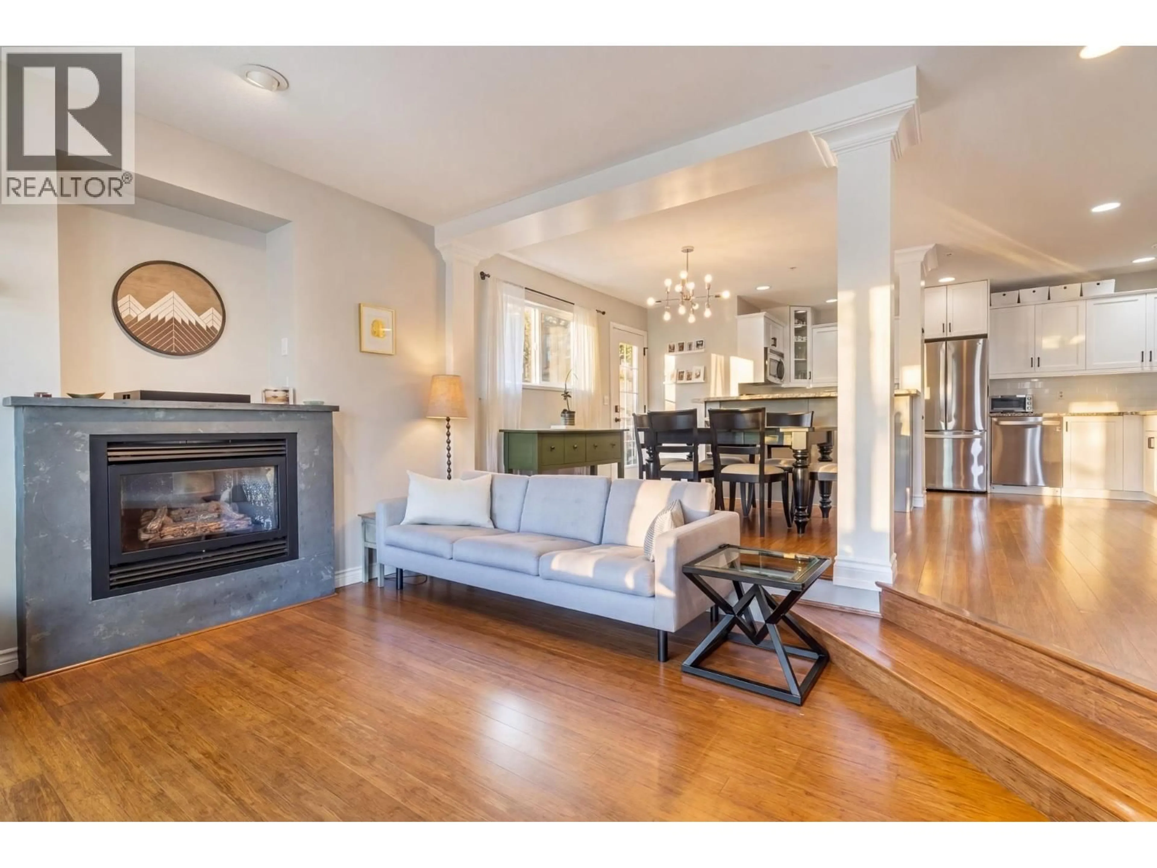 Living room with furniture, wood/laminate floor for 1922 6TH AVENUE, Vancouver British Columbia V5N1P7