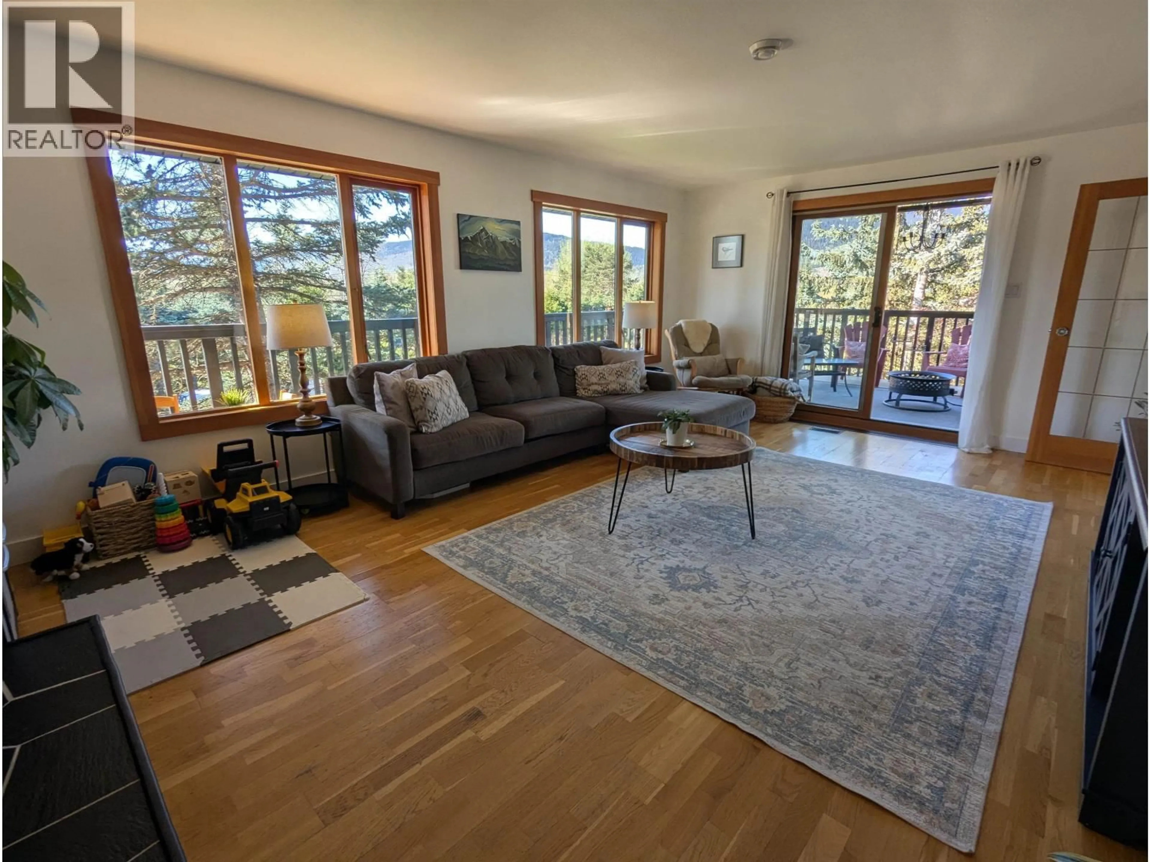 Living room with furniture, wood/laminate floor for 1995 DOMINION STREET, Smithers British Columbia V0J2N0