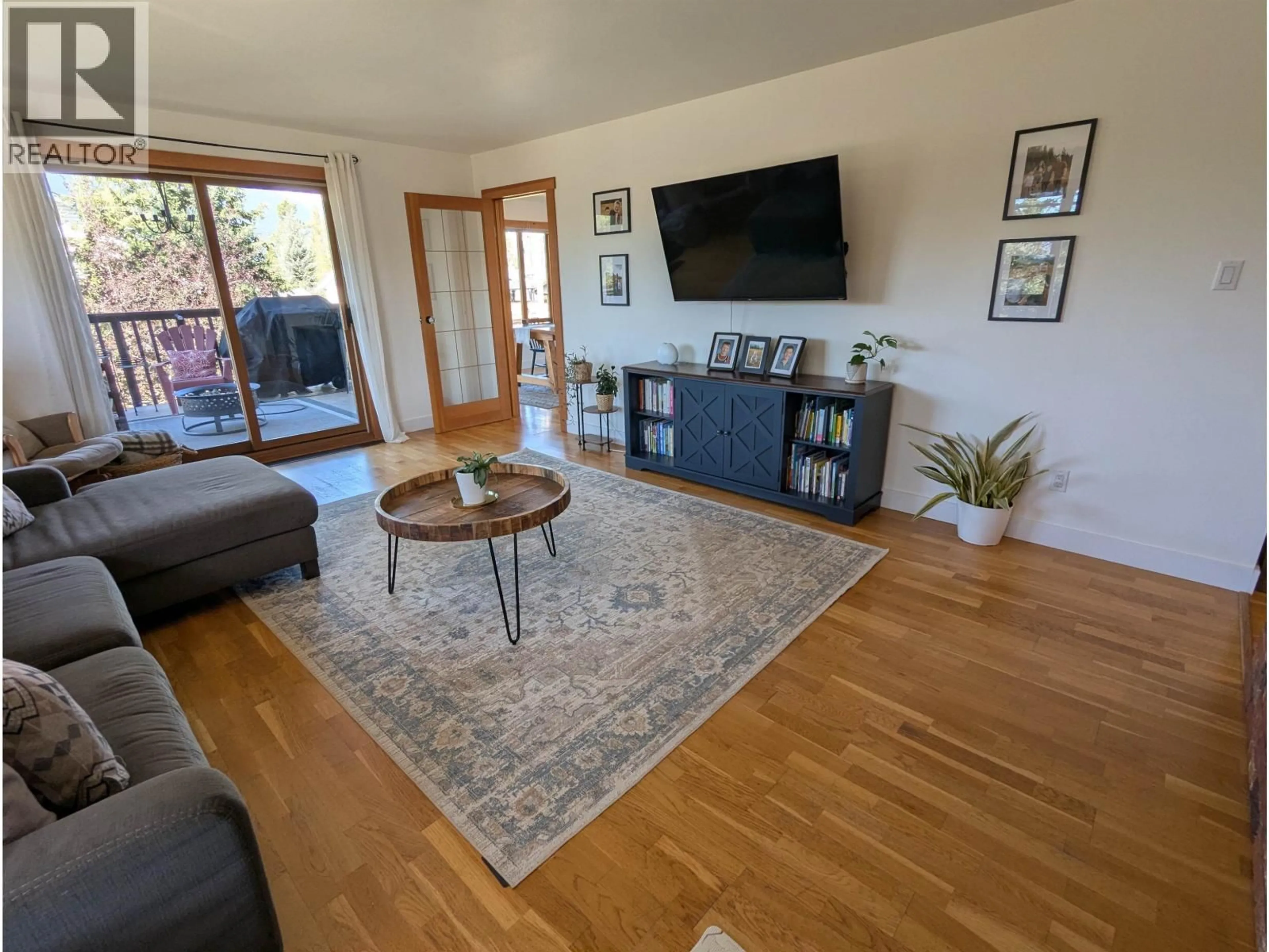 Living room with furniture, wood/laminate floor for 1995 DOMINION STREET, Smithers British Columbia V0J2N0