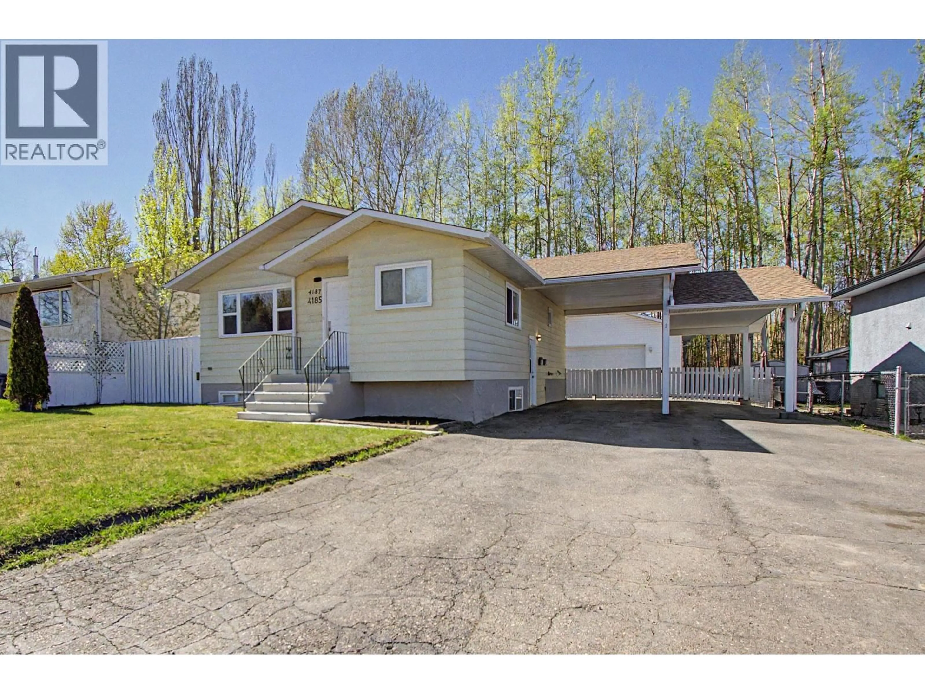 Home with vinyl exterior material, street for 4187 BAKER ROAD, Prince George British Columbia V2N5K2