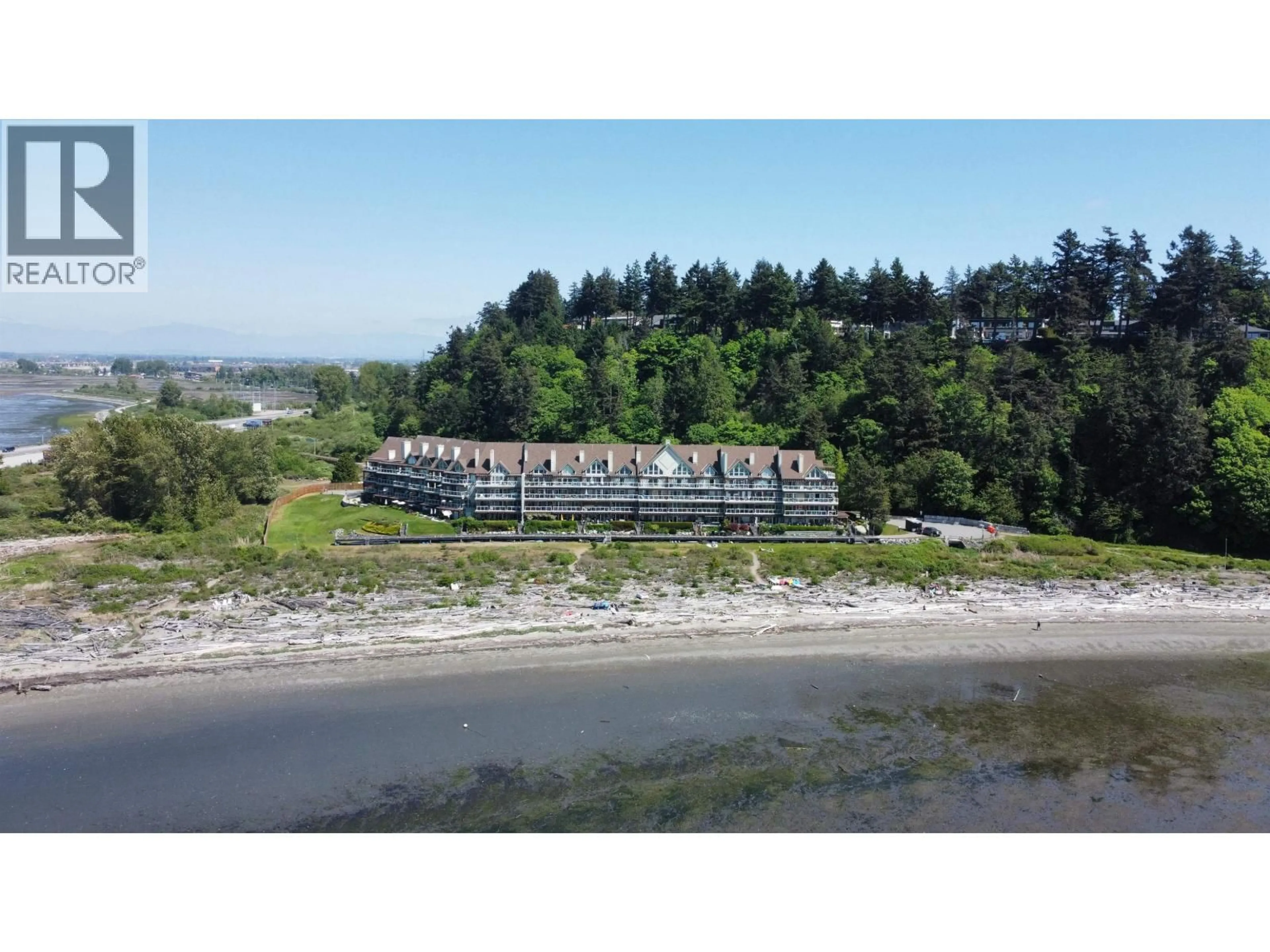 A pic from outside/outdoor area/front of a property/back of a property/a pic from drone, water/lake/river/ocean view for 306 - 1120 TSATSU SHORES DRIVE, Delta British Columbia V4M4G3