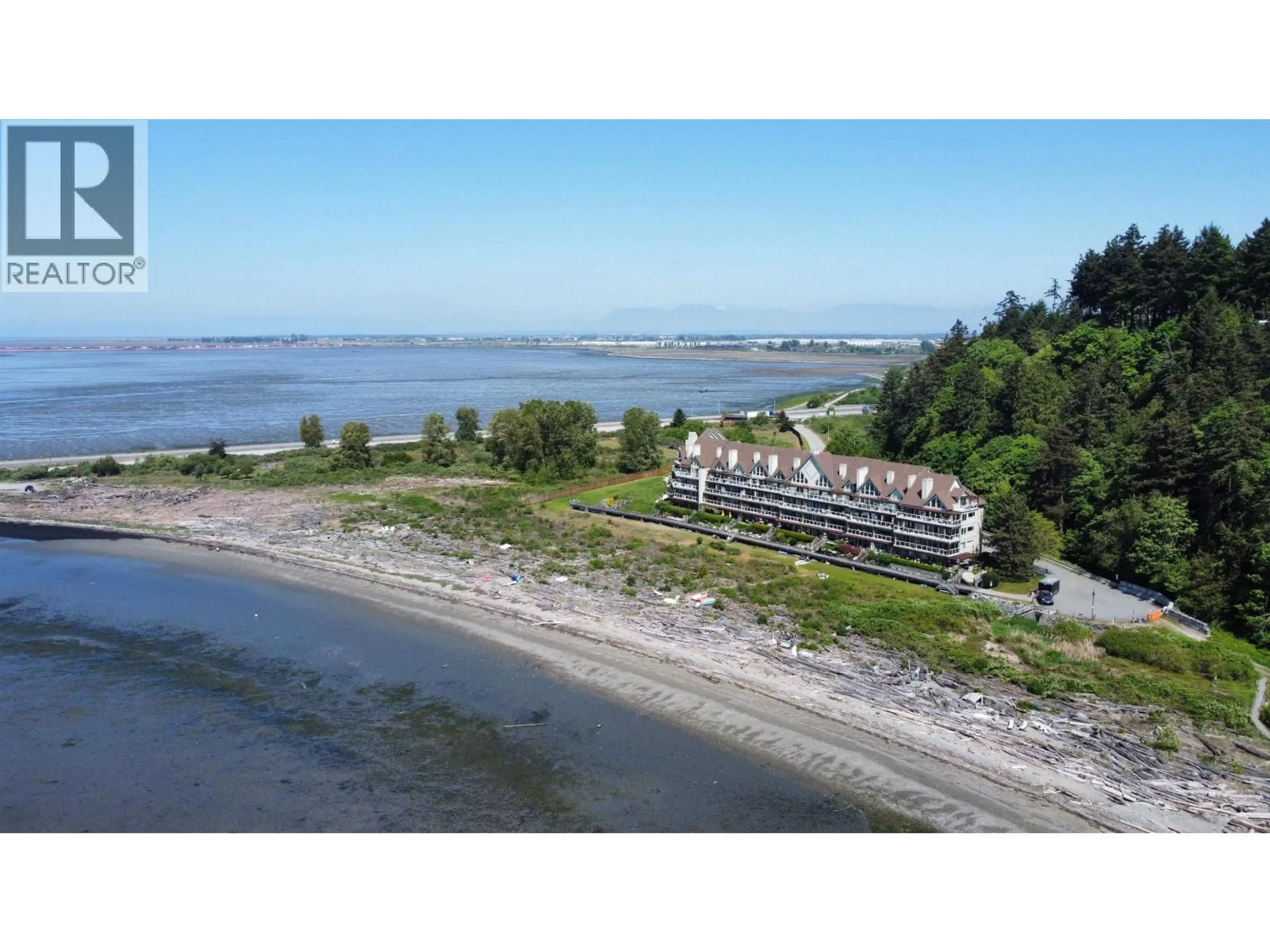 A pic from outside/outdoor area/front of a property/back of a property/a pic from drone, water/lake/river/ocean view for 306 - 1120 TSATSU SHORES DRIVE, Delta British Columbia V4M4G3