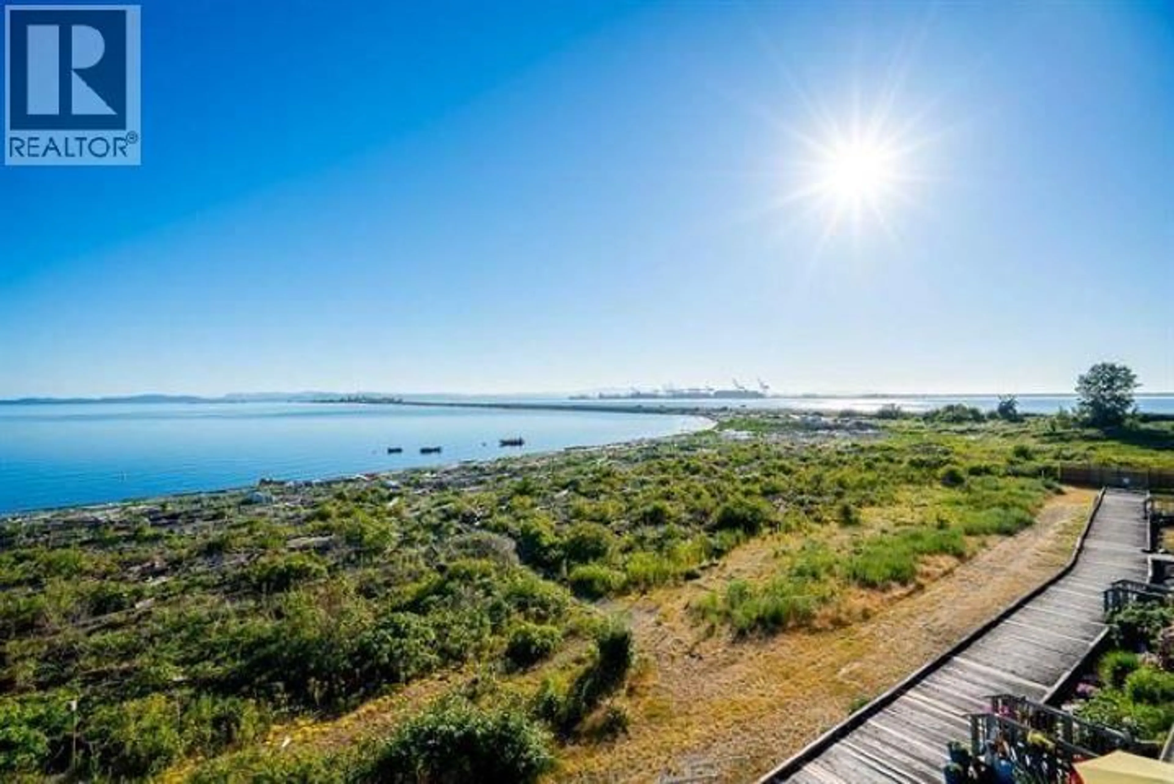A pic from outside/outdoor area/front of a property/back of a property/a pic from drone, water/lake/river/ocean view for 306 - 1120 TSATSU SHORES DRIVE, Delta British Columbia V4M4G3