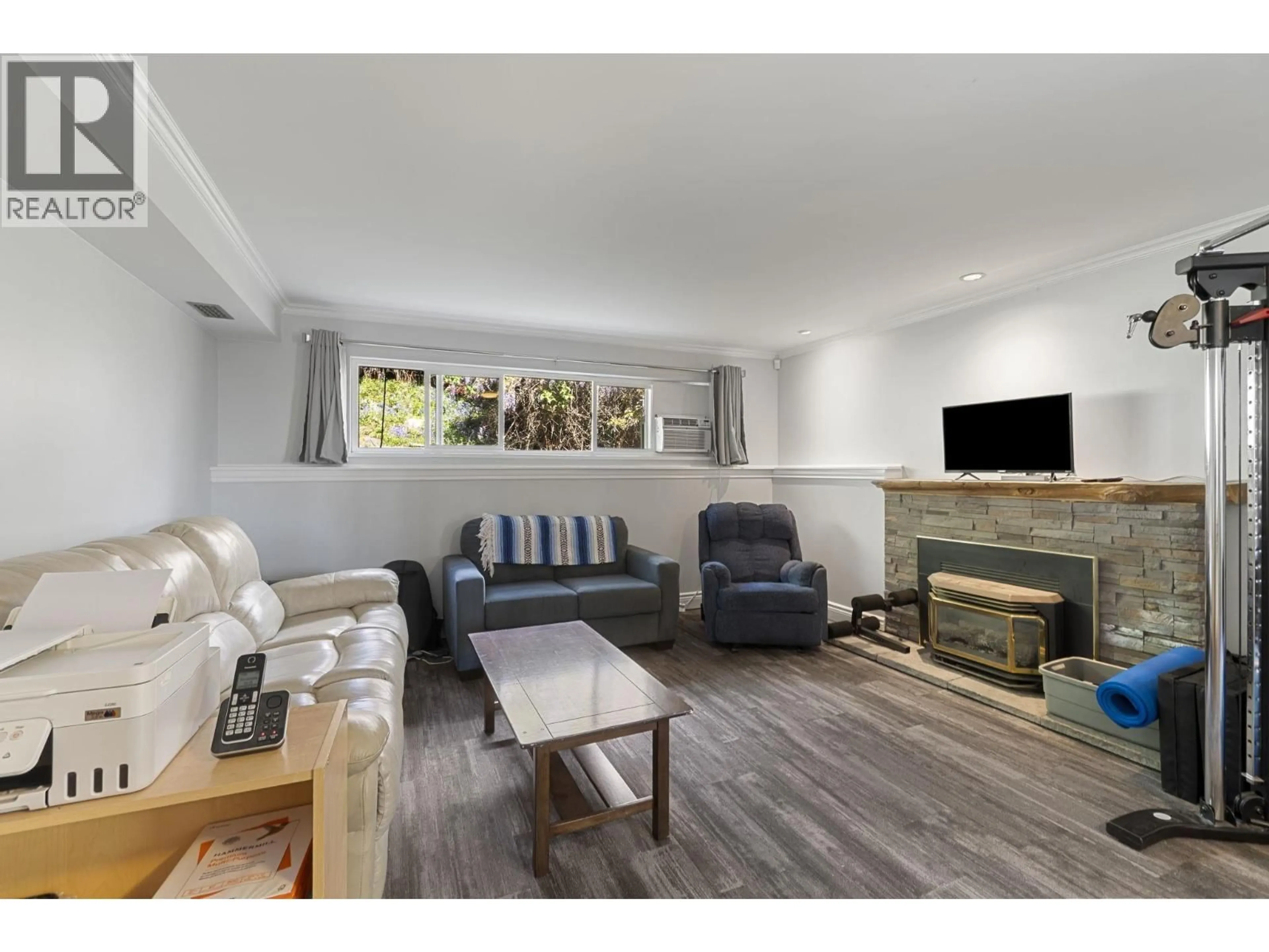 Living room with furniture, wood/laminate floor for 1447 COLUMBIA AVENUE, Port Coquitlam British Columbia V3C1C5