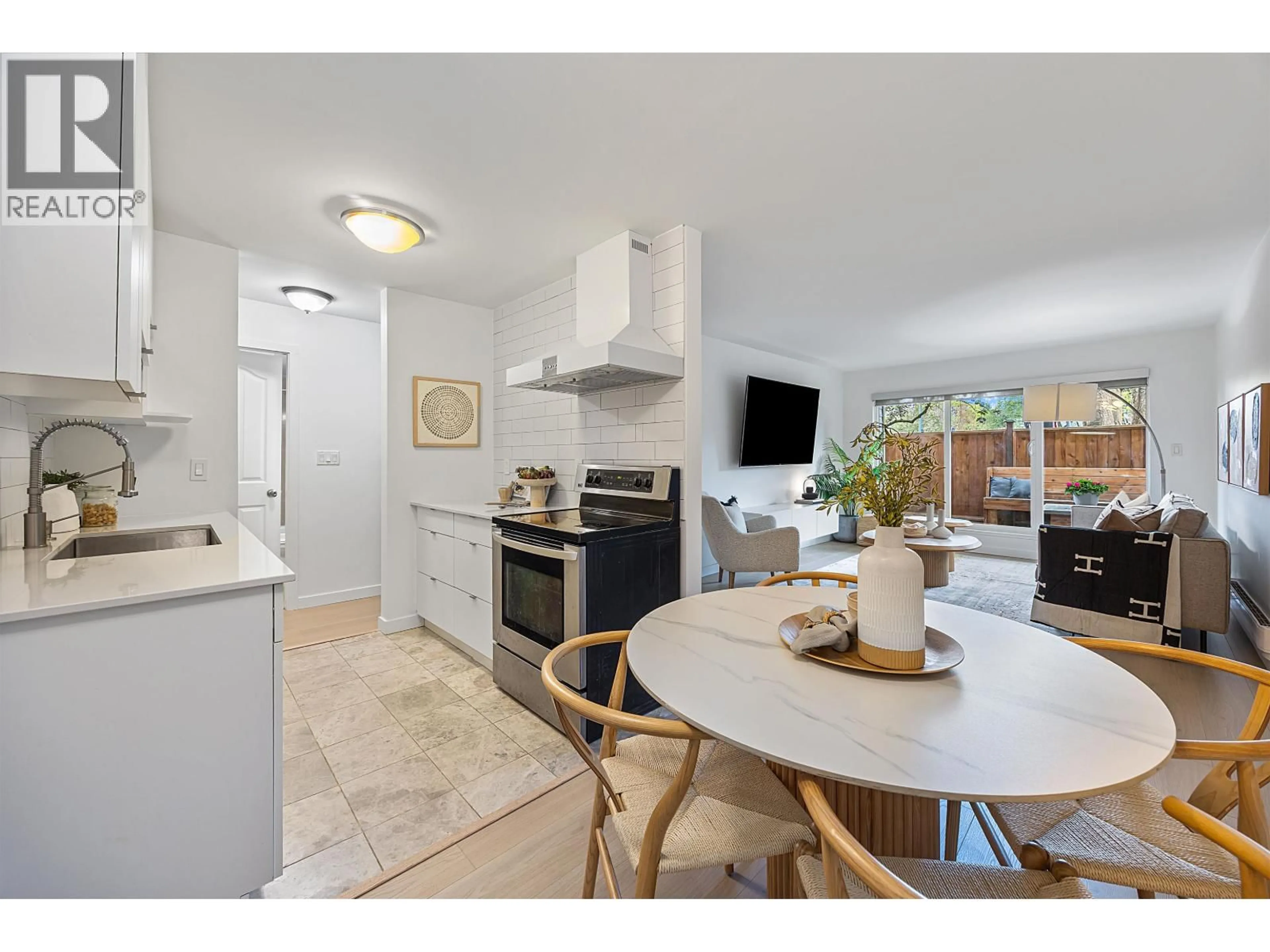 Open concept kitchen, ceramic/tile floor for 105 - 1440 BROADWAY, Vancouver British Columbia V5N5P2
