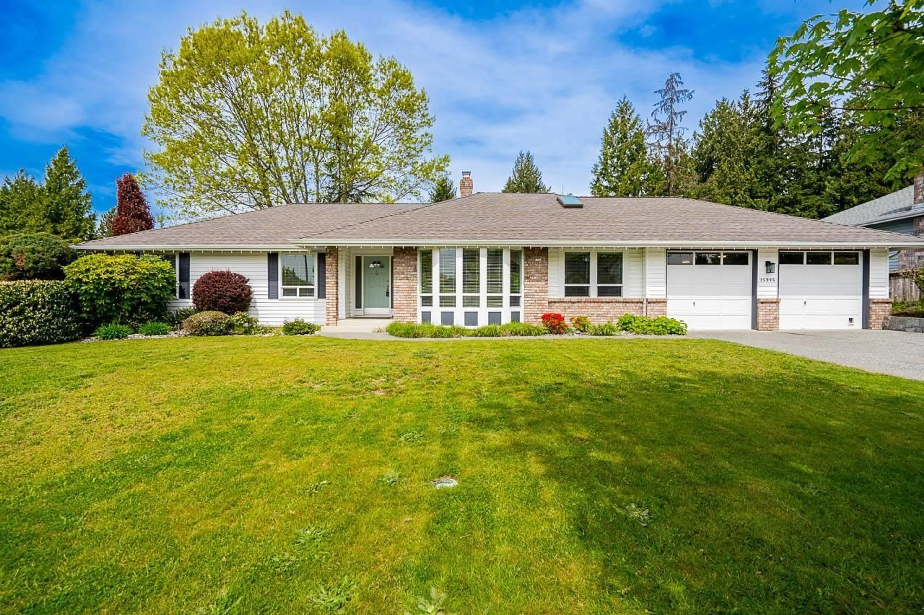 Home with vinyl exterior material, street for 15395 112A AVENUE, Surrey British Columbia V3R8Z2