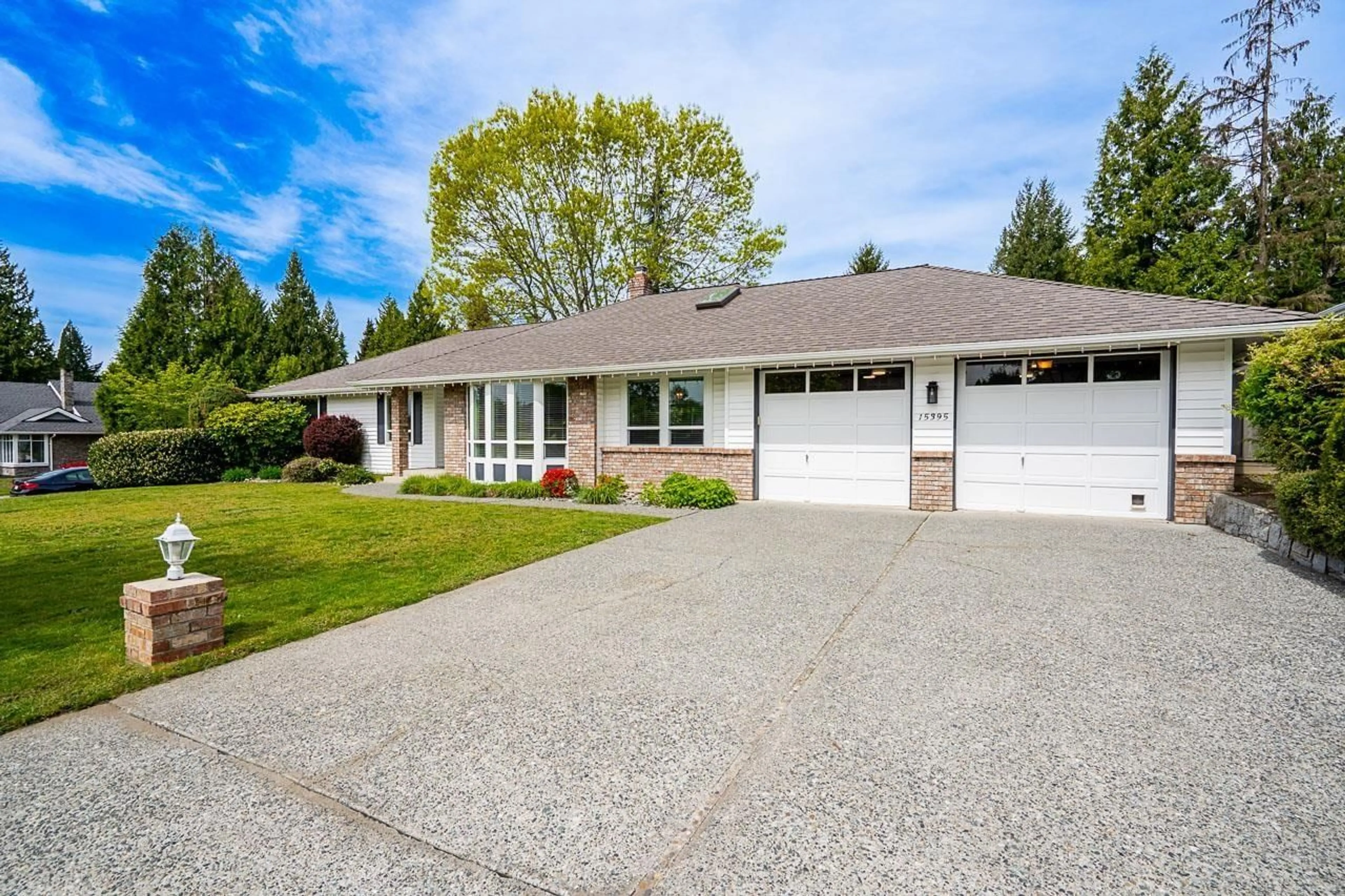 Home with vinyl exterior material, street for 15395 112A AVENUE, Surrey British Columbia V3R8Z2