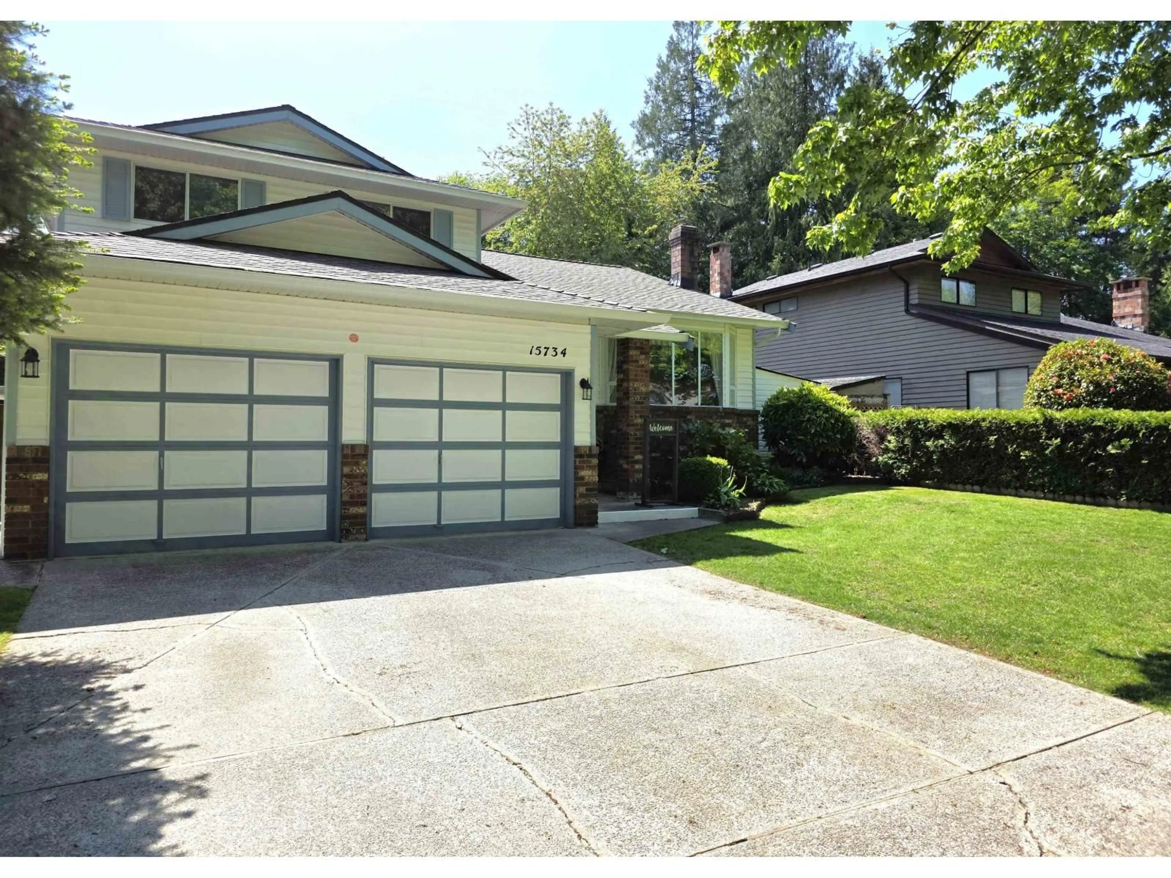Home with vinyl exterior material, street for 15734 97A AVENUE, Surrey British Columbia V4N2V1