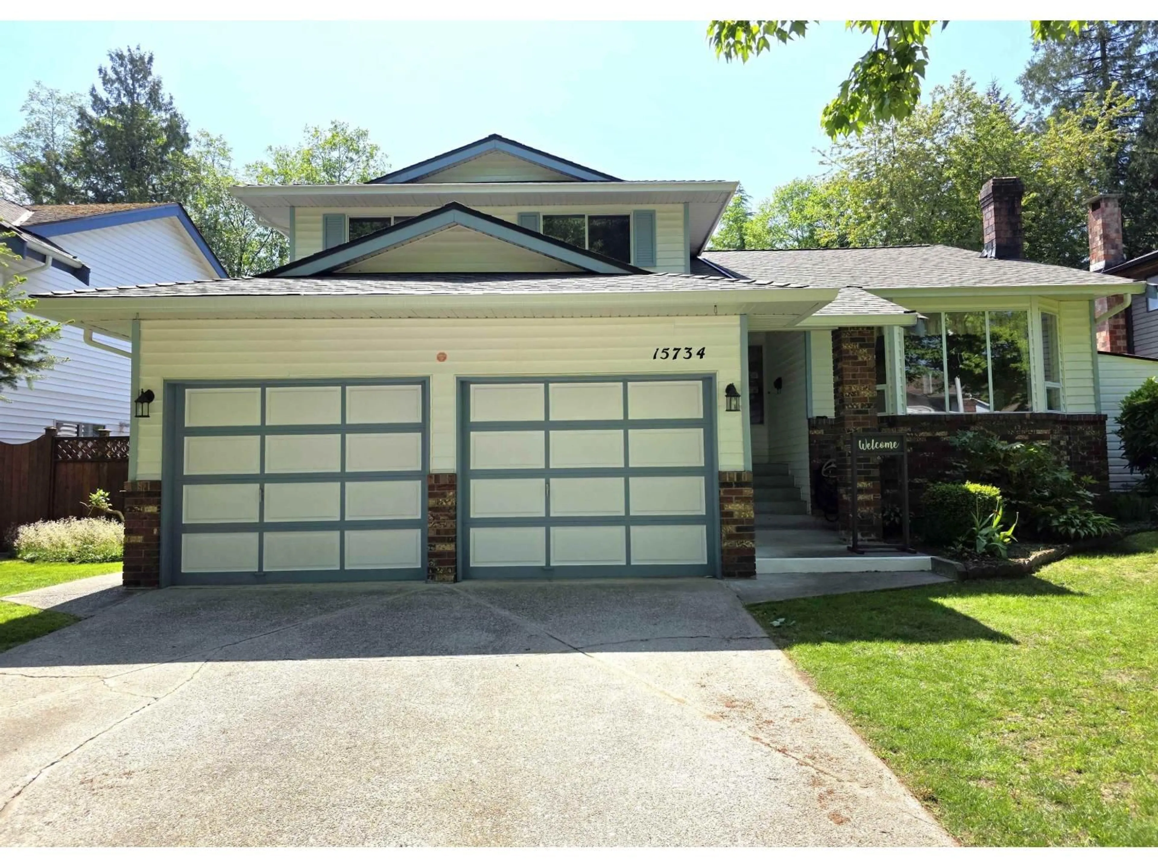 Home with vinyl exterior material, street for 15734 97A AVENUE, Surrey British Columbia V4N2V1