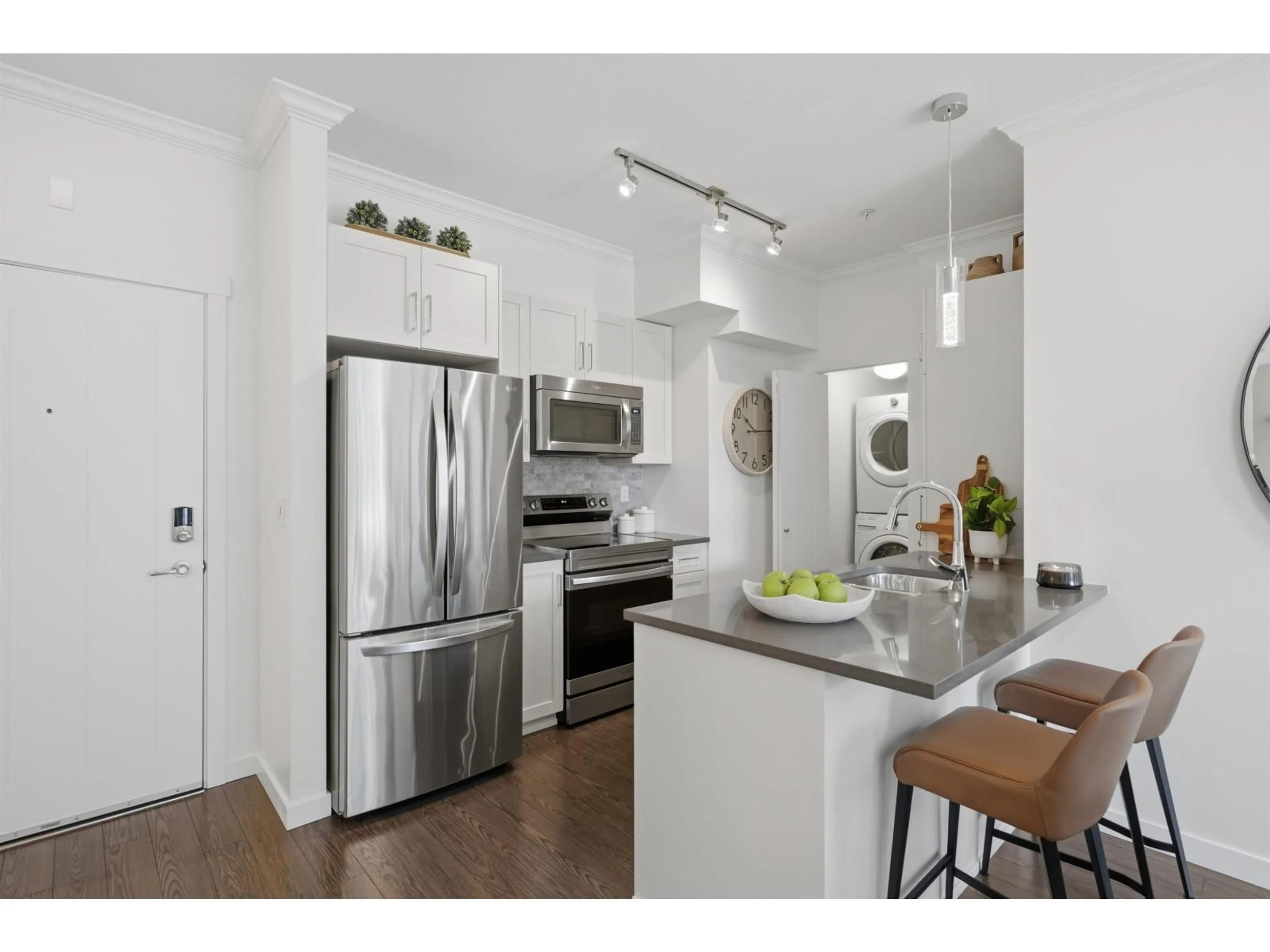 Open concept kitchen, wood/laminate floor for 302 - 2855 156 STREET, Surrey British Columbia V3Z3Y3