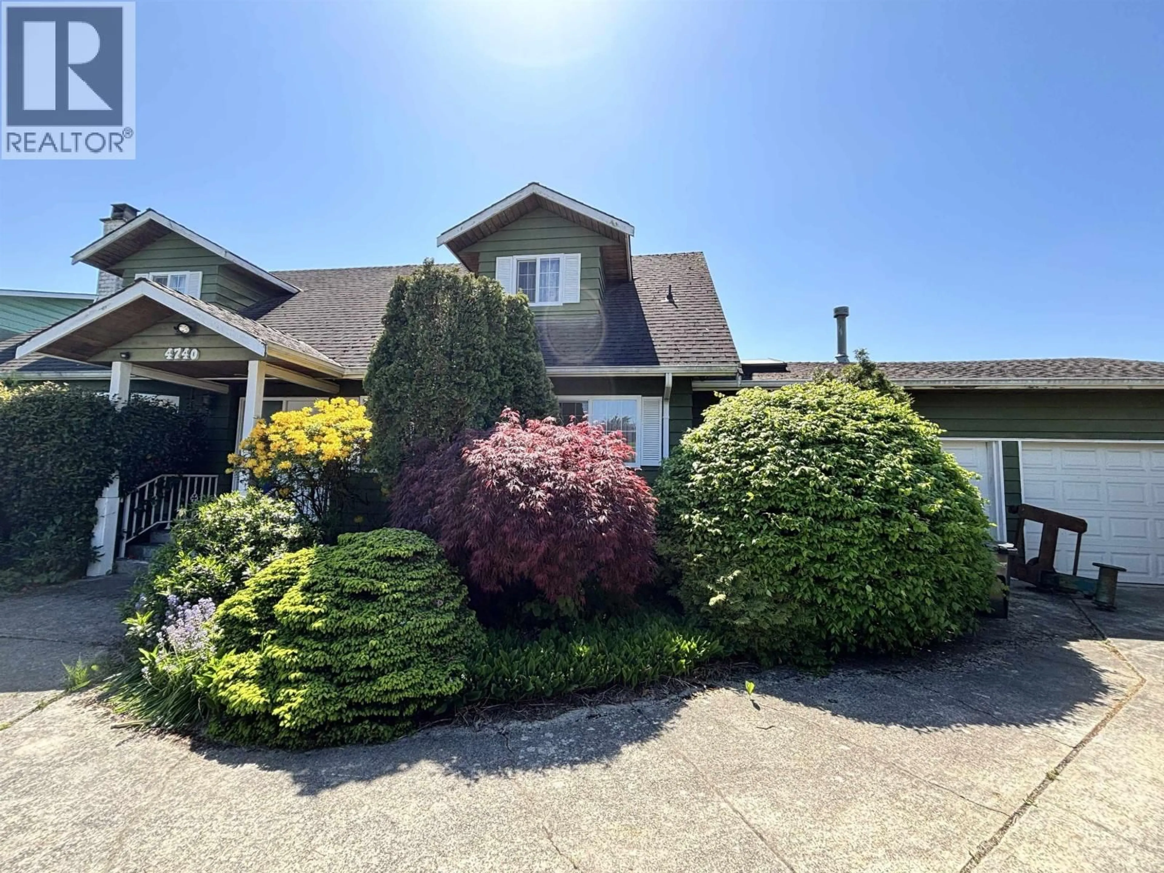 A pic from outside/outdoor area/front of a property/back of a property/a pic from drone, street for 4740 MCLURE AVENUE, Richmond British Columbia V7C4J9