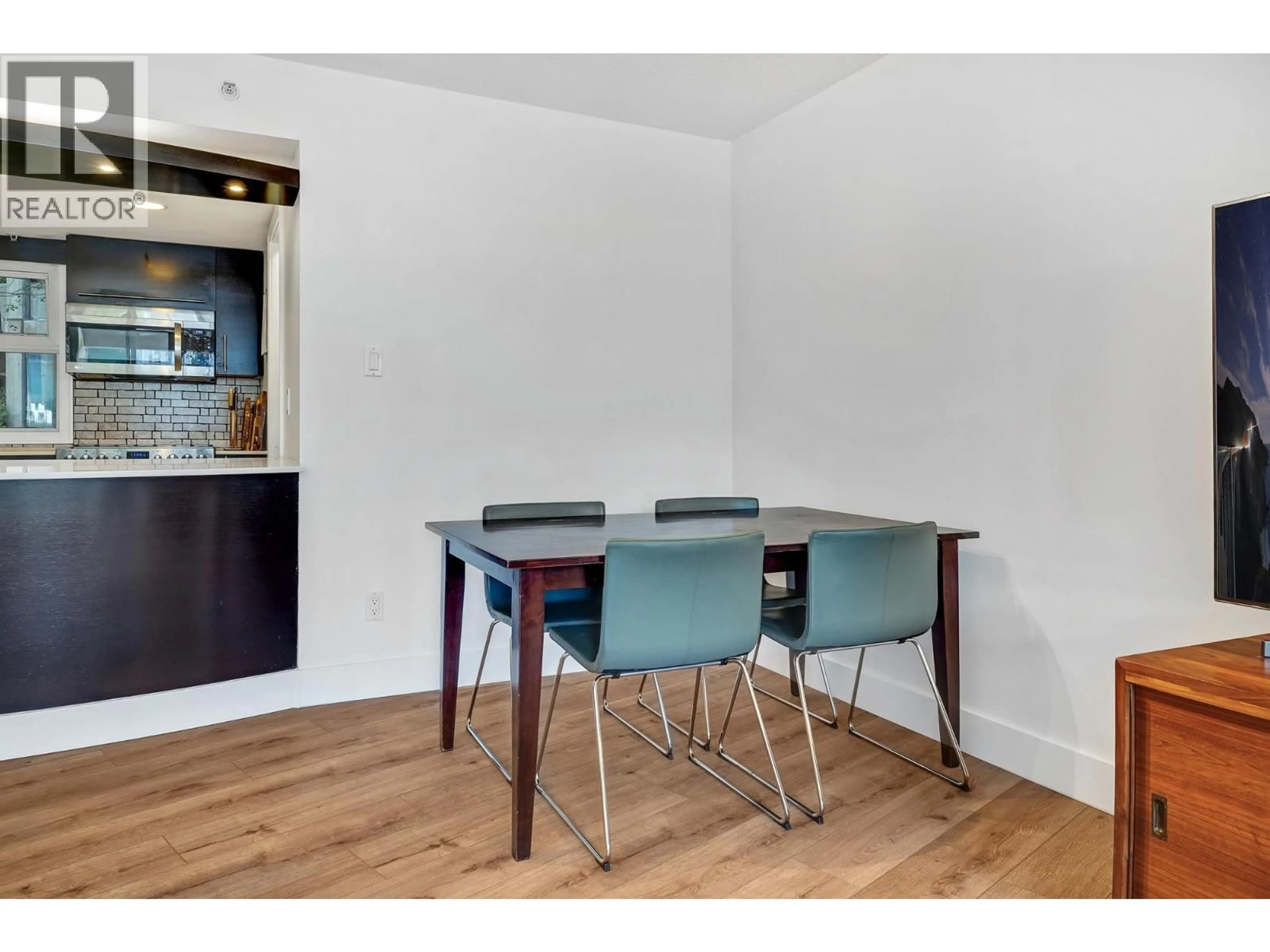 Dining room, wood/laminate floor for 306 - 183 KEEFER PLACE, Vancouver British Columbia V6B6B9