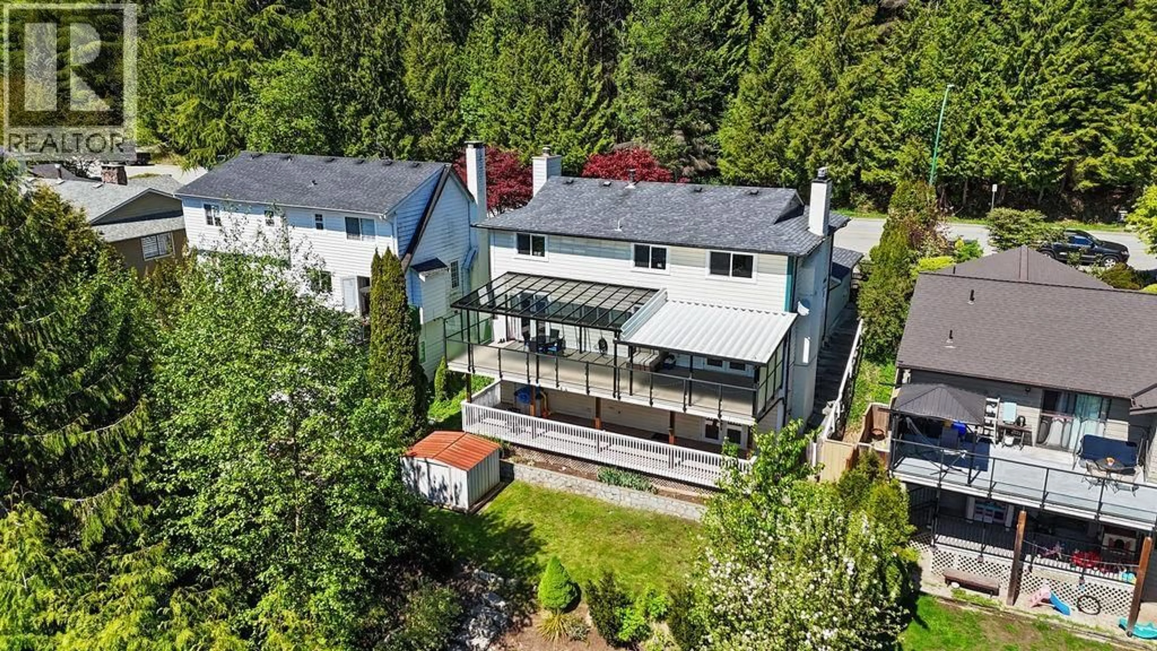 A pic from outside/outdoor area/front of a property/back of a property/a pic from drone, unknown for 707 BRAEMAR ROAD, North Vancouver British Columbia V7N4G1