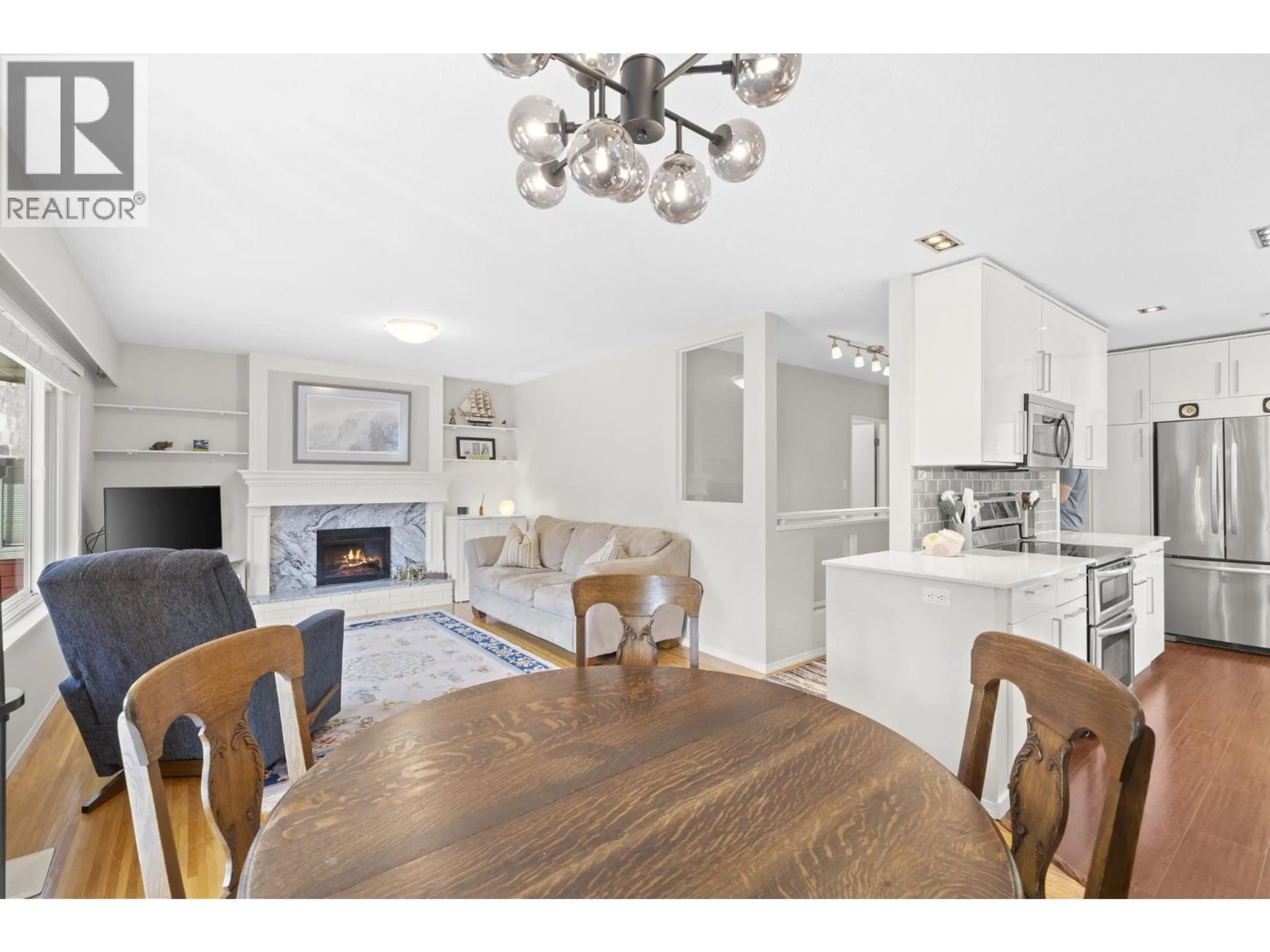Open concept kitchen, wood/laminate floor for 3444 CHURCH STREET, North Vancouver British Columbia V7K2L4