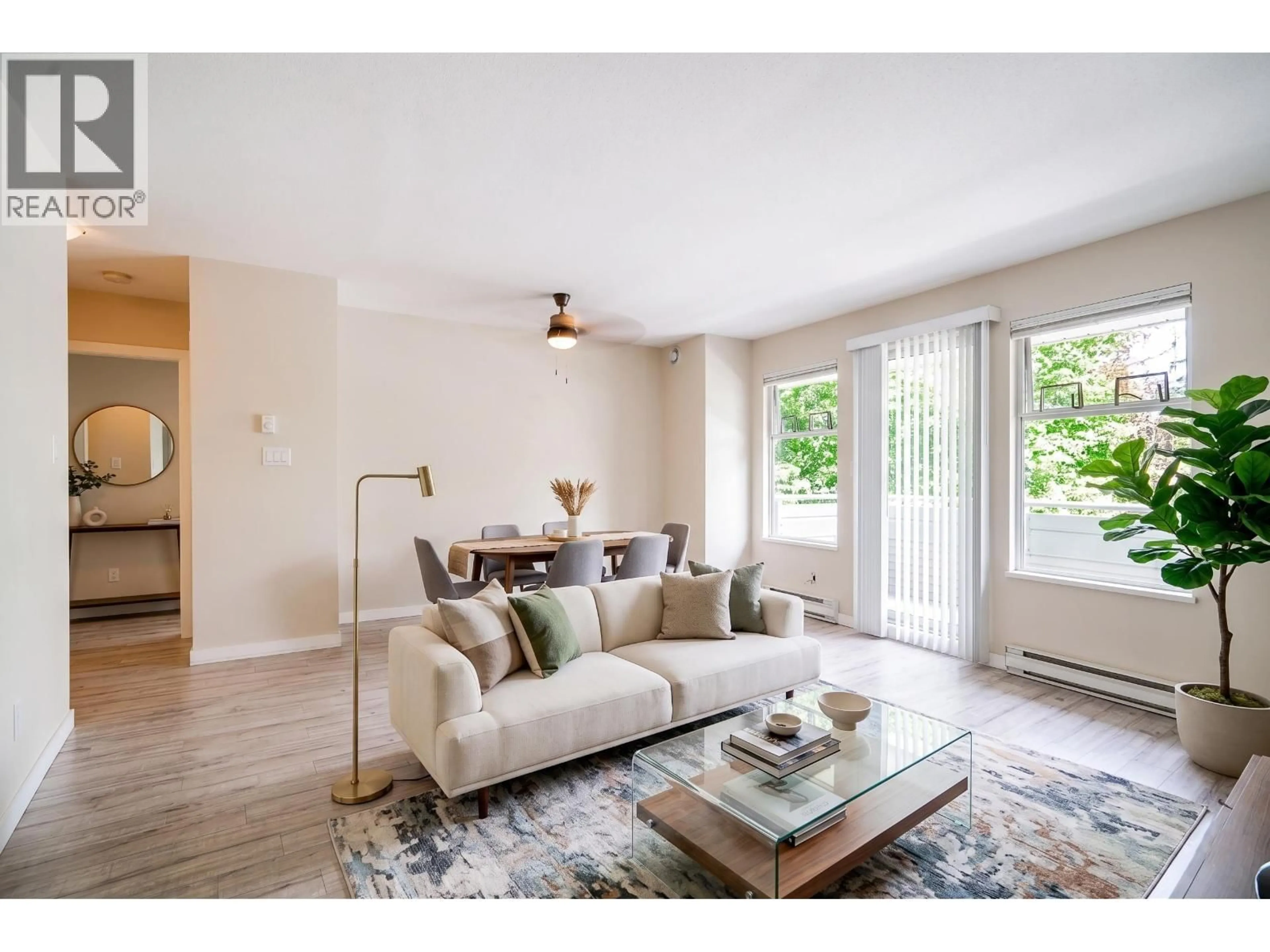 Living room with furniture, wood/laminate floor for 204 - 3183 ESMOND AVENUE, Burnaby British Columbia V5G4V6