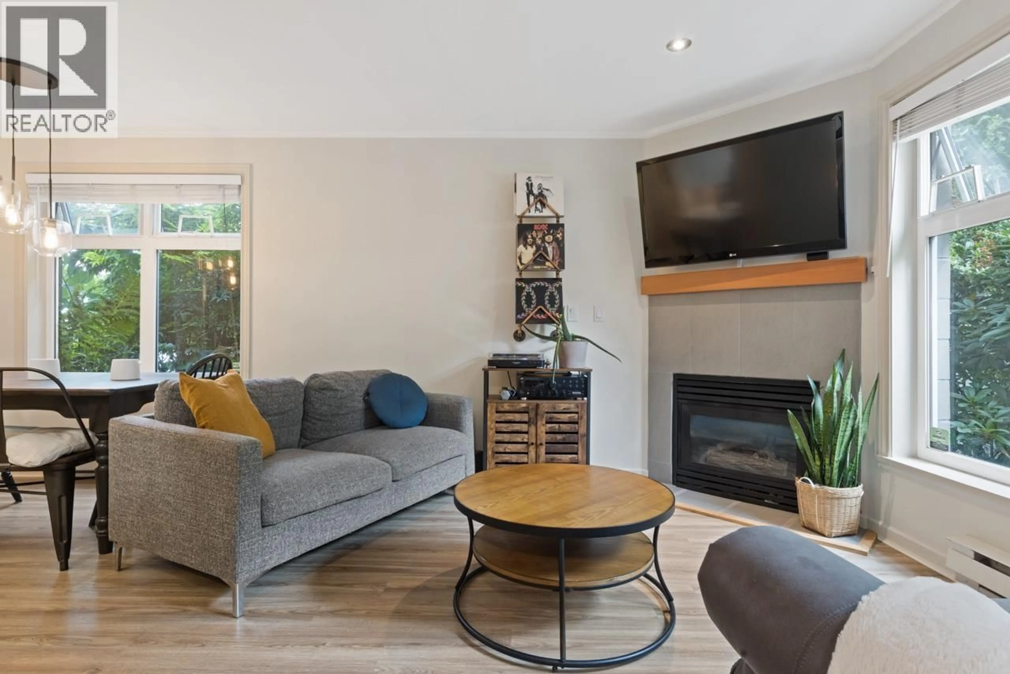 Living room with furniture, wood/laminate floor for 106 - 2588 ALDER STREET, Vancouver British Columbia V6H4E3