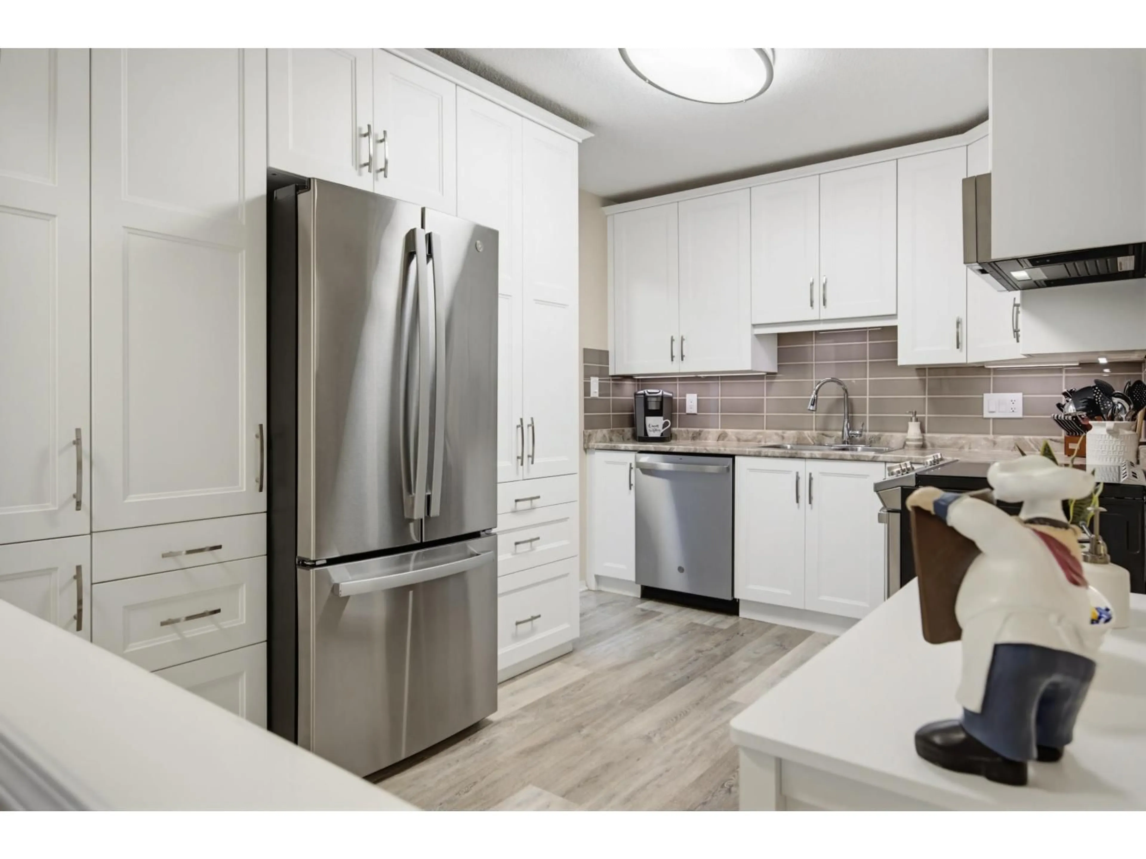 Open concept kitchen, unknown for 302 - 5375 205 STREET, Langley British Columbia V3A7V7