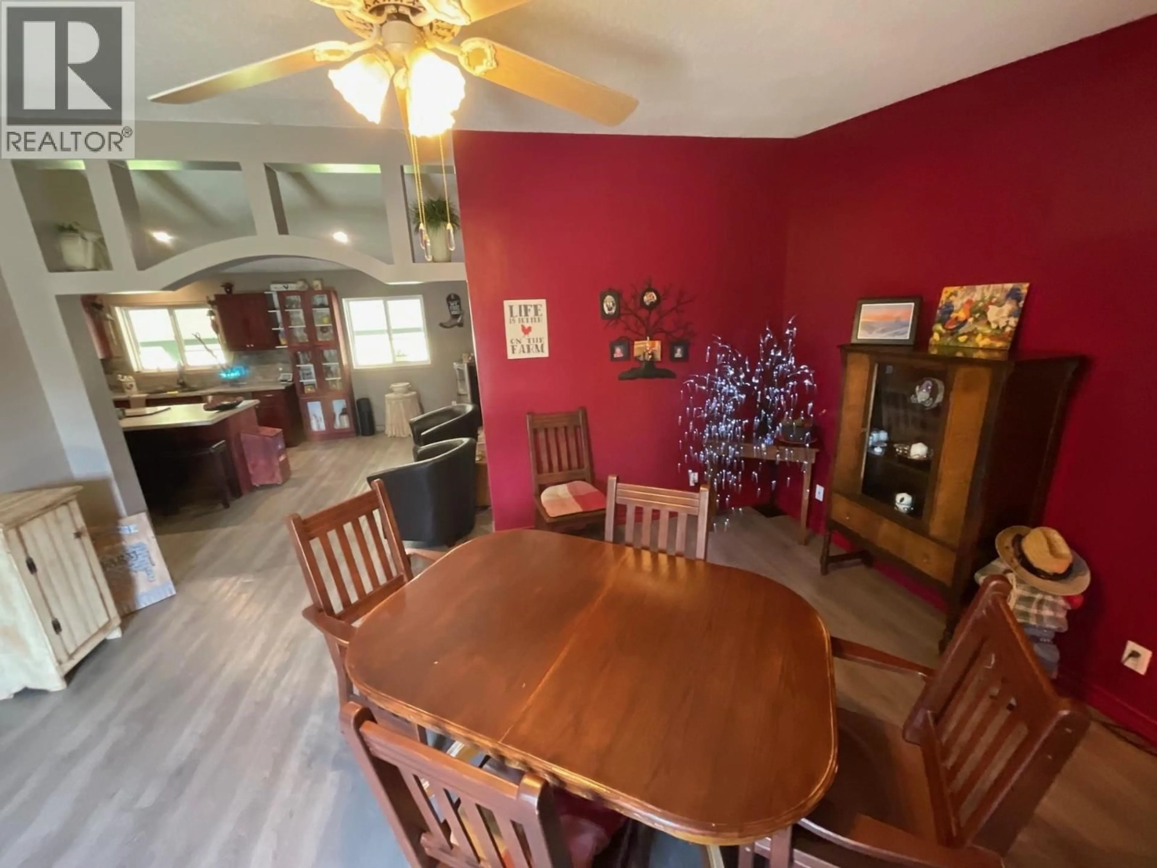 Dining room, wood/laminate floor for 10264 97 HIGHWAY, Charlie Lake British Columbia V1J8L9