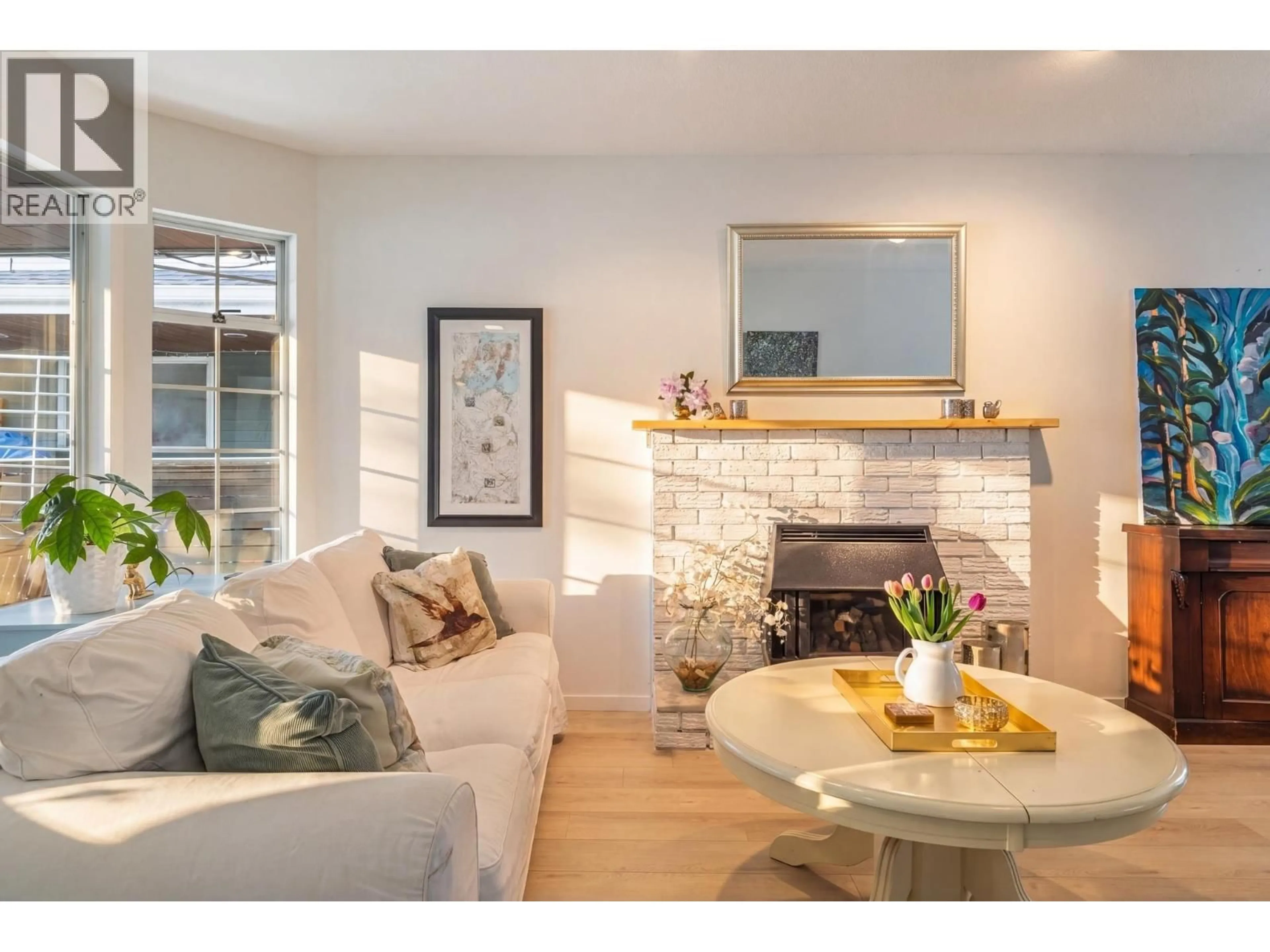 Living room with furniture, wood/laminate floor for 3660 GARRY STREET, Richmond British Columbia V7E2T3