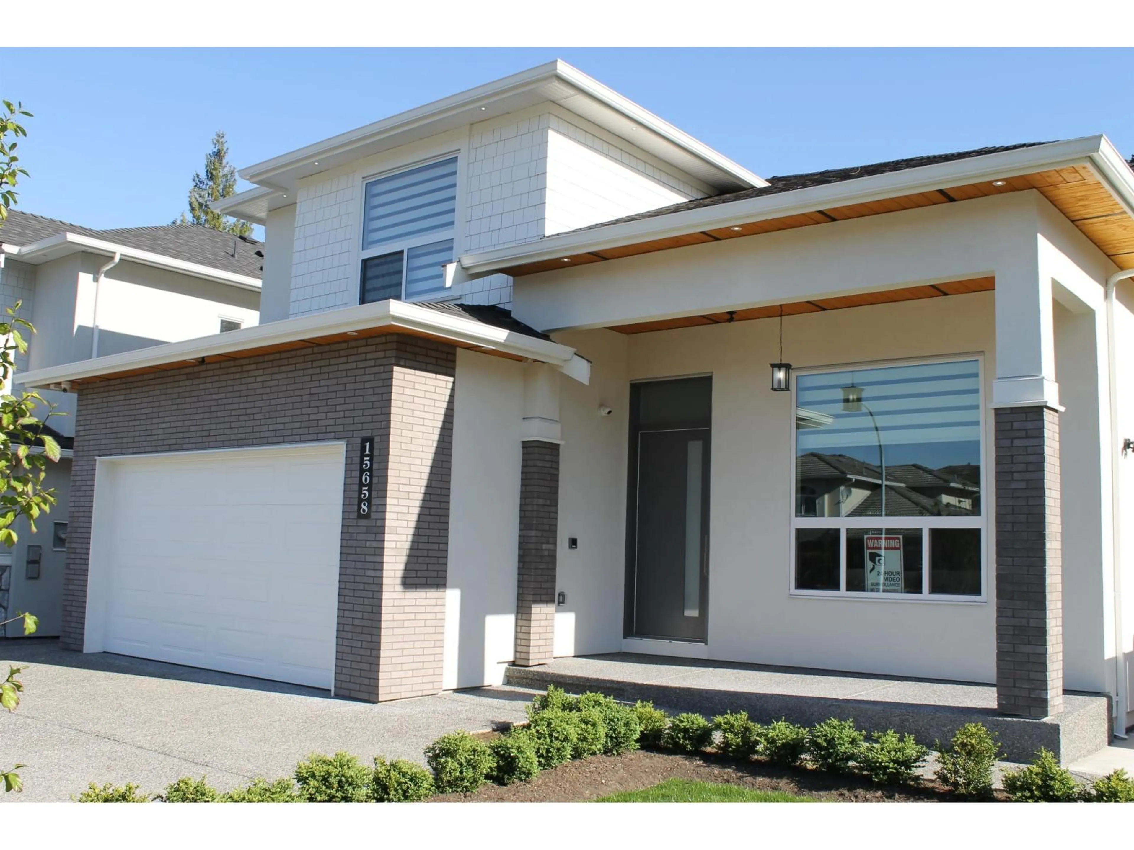 Home with vinyl exterior material, street for 15658 82A AVENUE, Surrey British Columbia V4N0R9