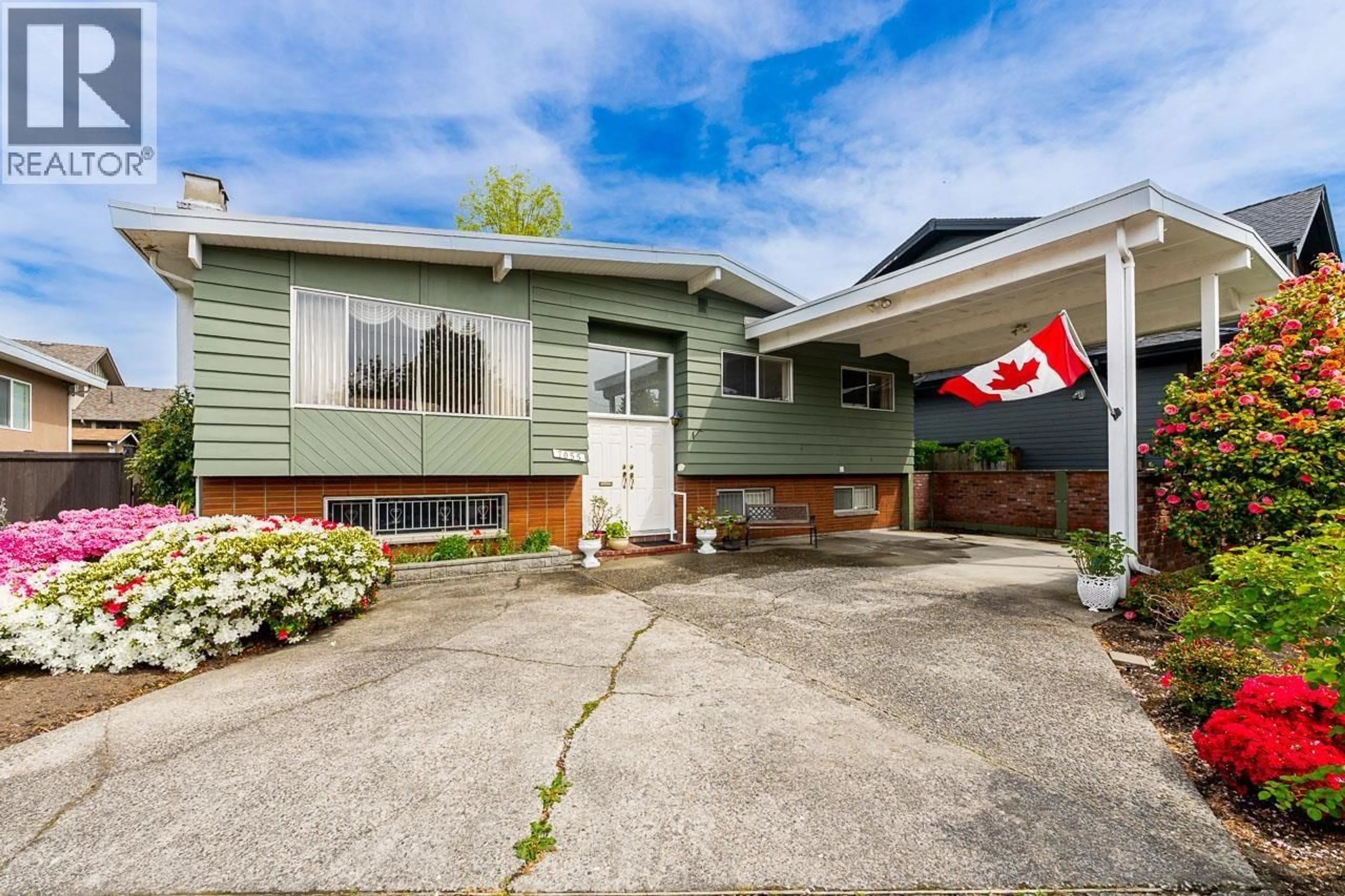 Home with vinyl exterior material, street for 7055 KITCHENER STREET, Burnaby British Columbia V5A1K8