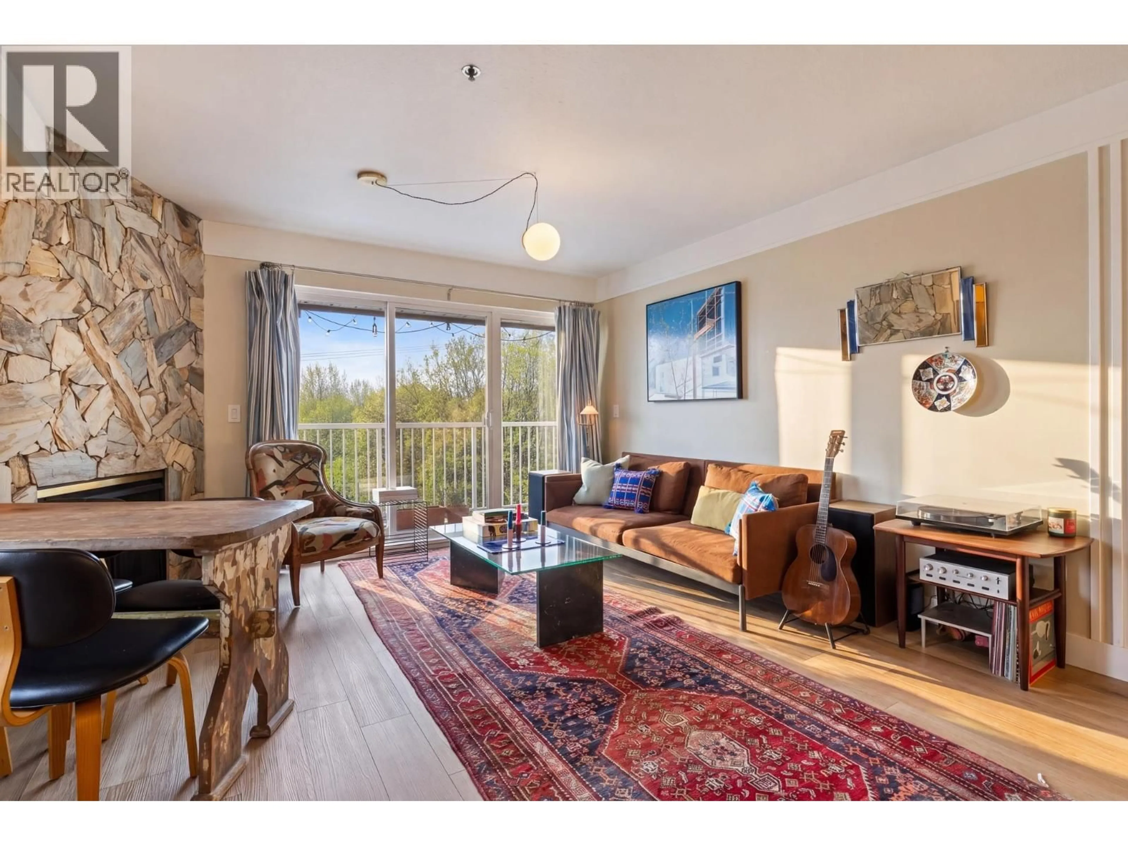 Living room with furniture, unknown for 403 - 2295 PANDORA STREET, Vancouver British Columbia V5L1N6