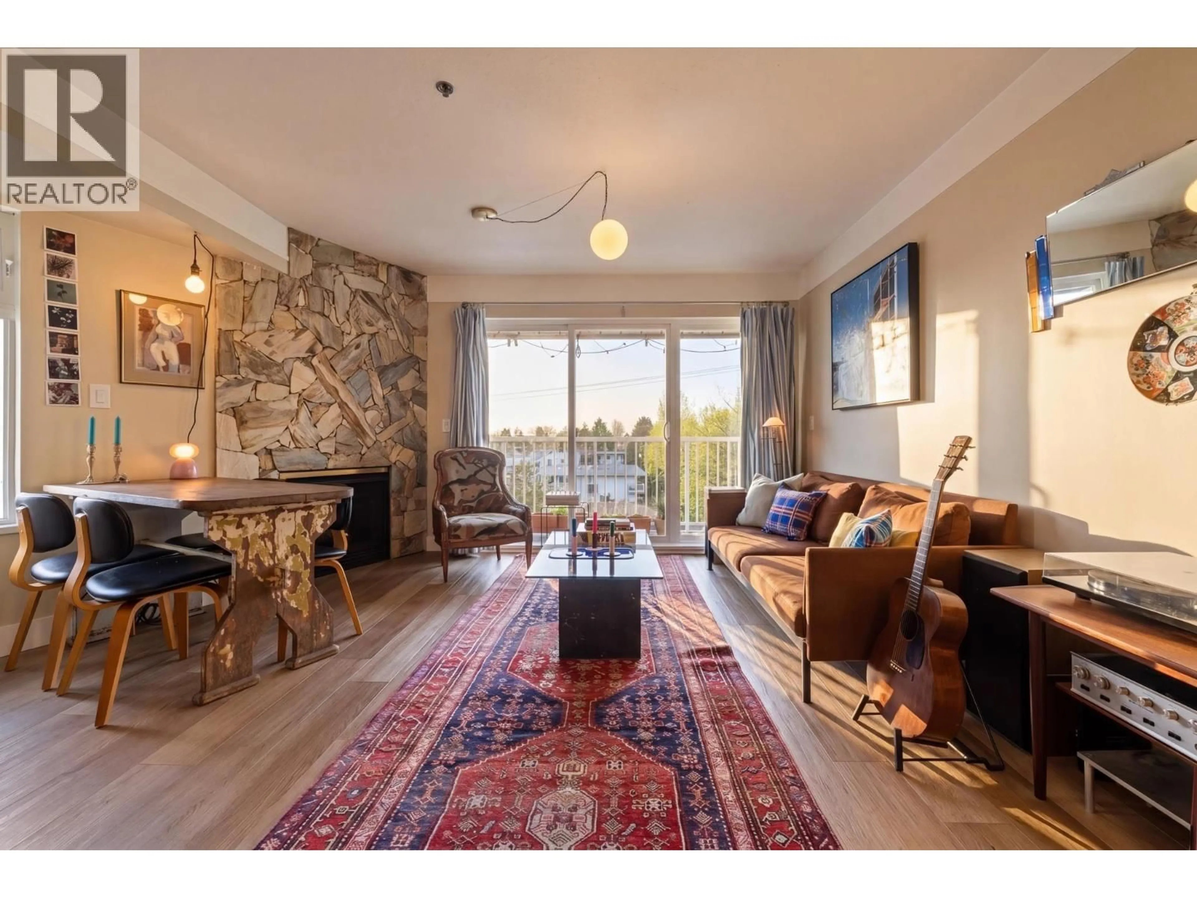 Living room with furniture, unknown for 403 - 2295 PANDORA STREET, Vancouver British Columbia V5L1N6