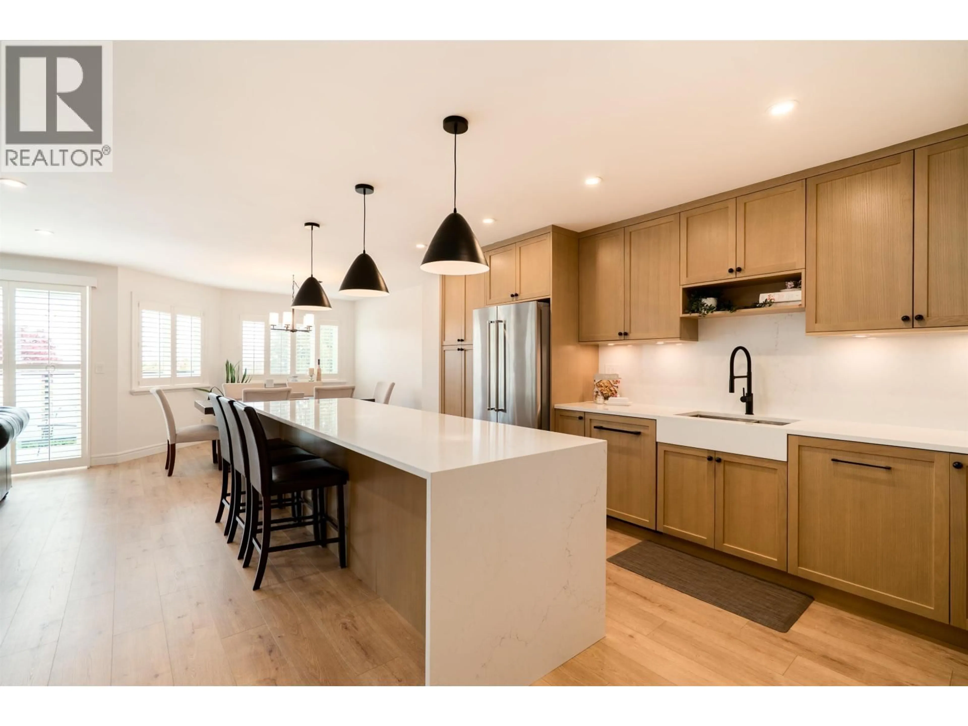 Open concept kitchen, wood/laminate floor for 132 - 2721 ATLIN PLACE, Coquitlam British Columbia V3C5B1