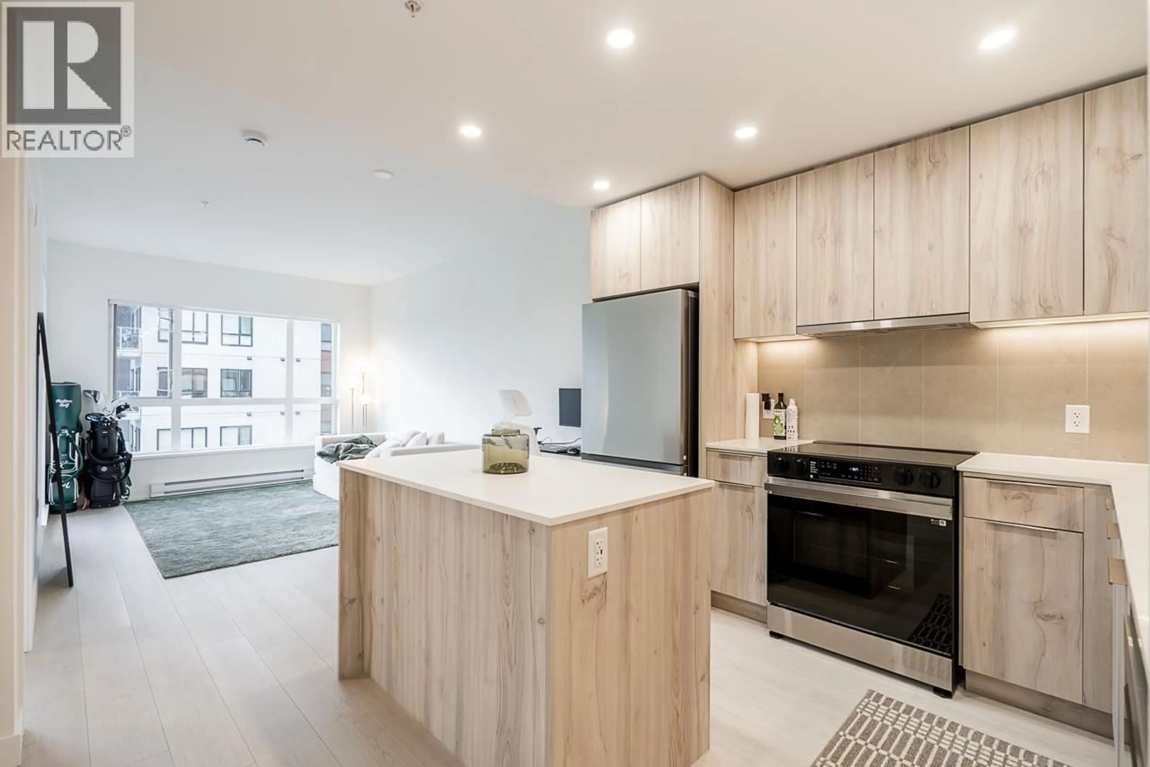 Open concept kitchen, unknown for 317 - 3594 MALSUM DRIVE, North Vancouver British Columbia V7G0B4