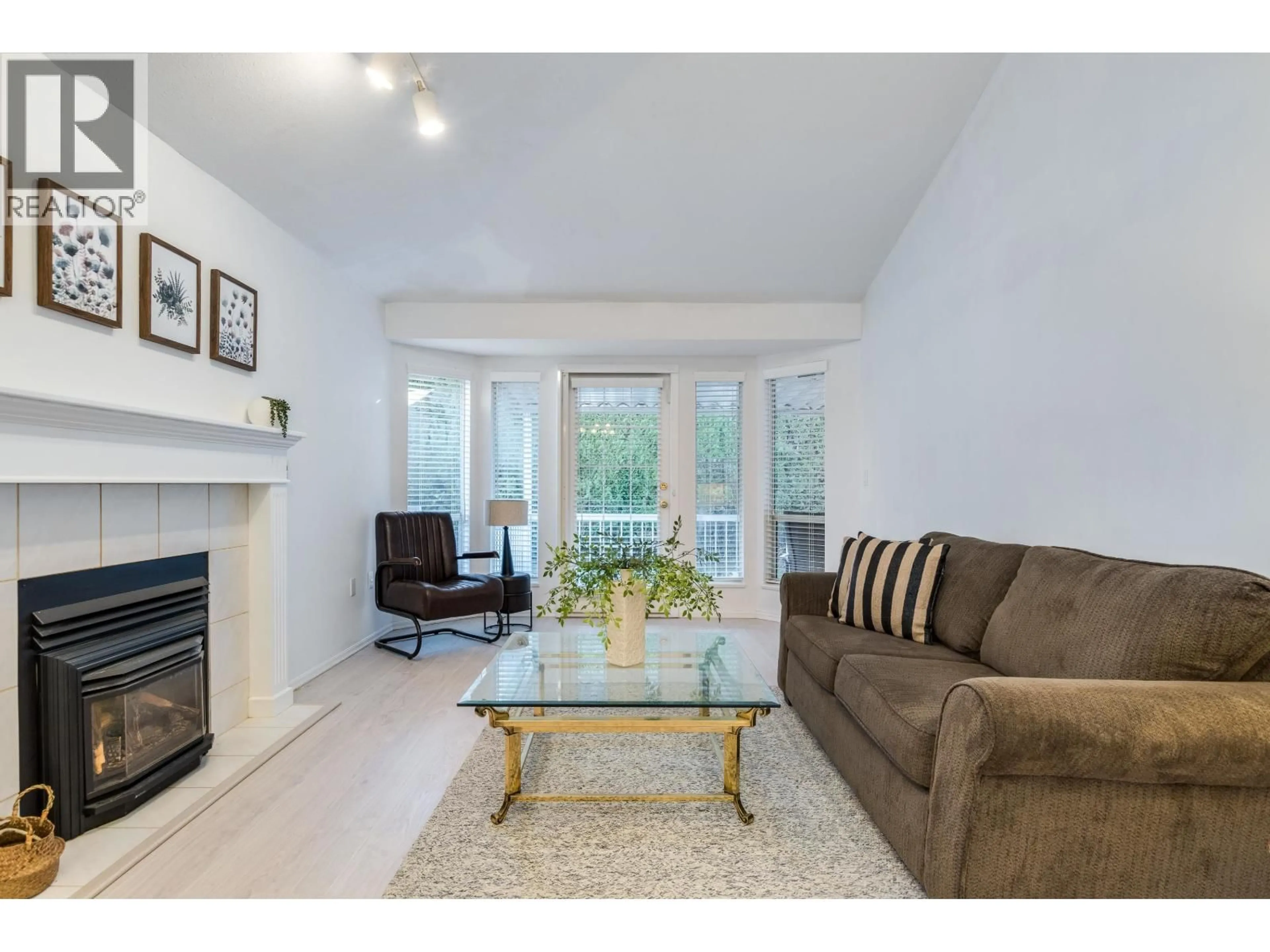 Living room with furniture, wood/laminate floor for 14 - 11950 LAITY STREET, Maple Ridge British Columbia V2X5A6