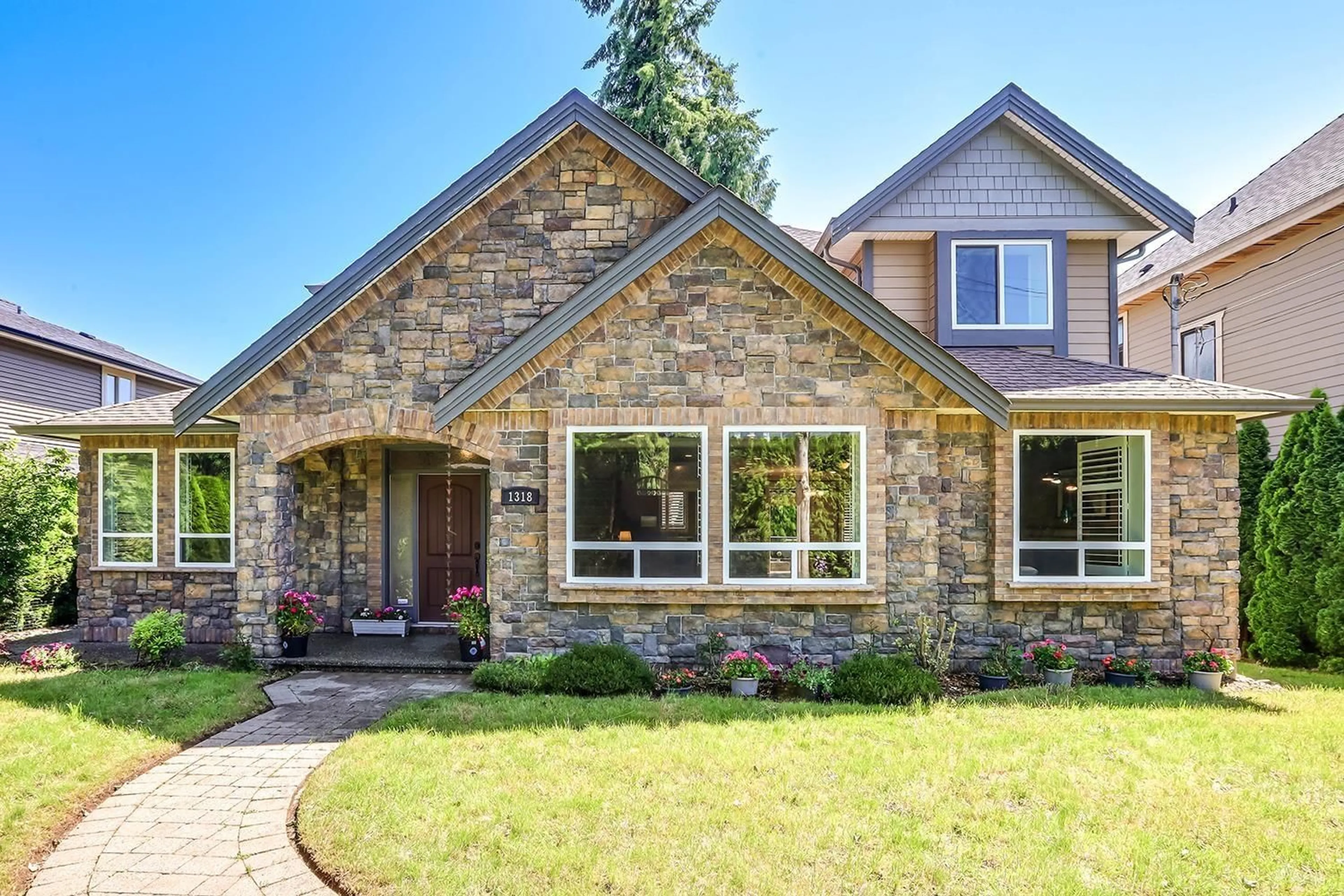 Home with brick exterior material, street for 1318 160 STREET, Surrey British Columbia V4A4W8