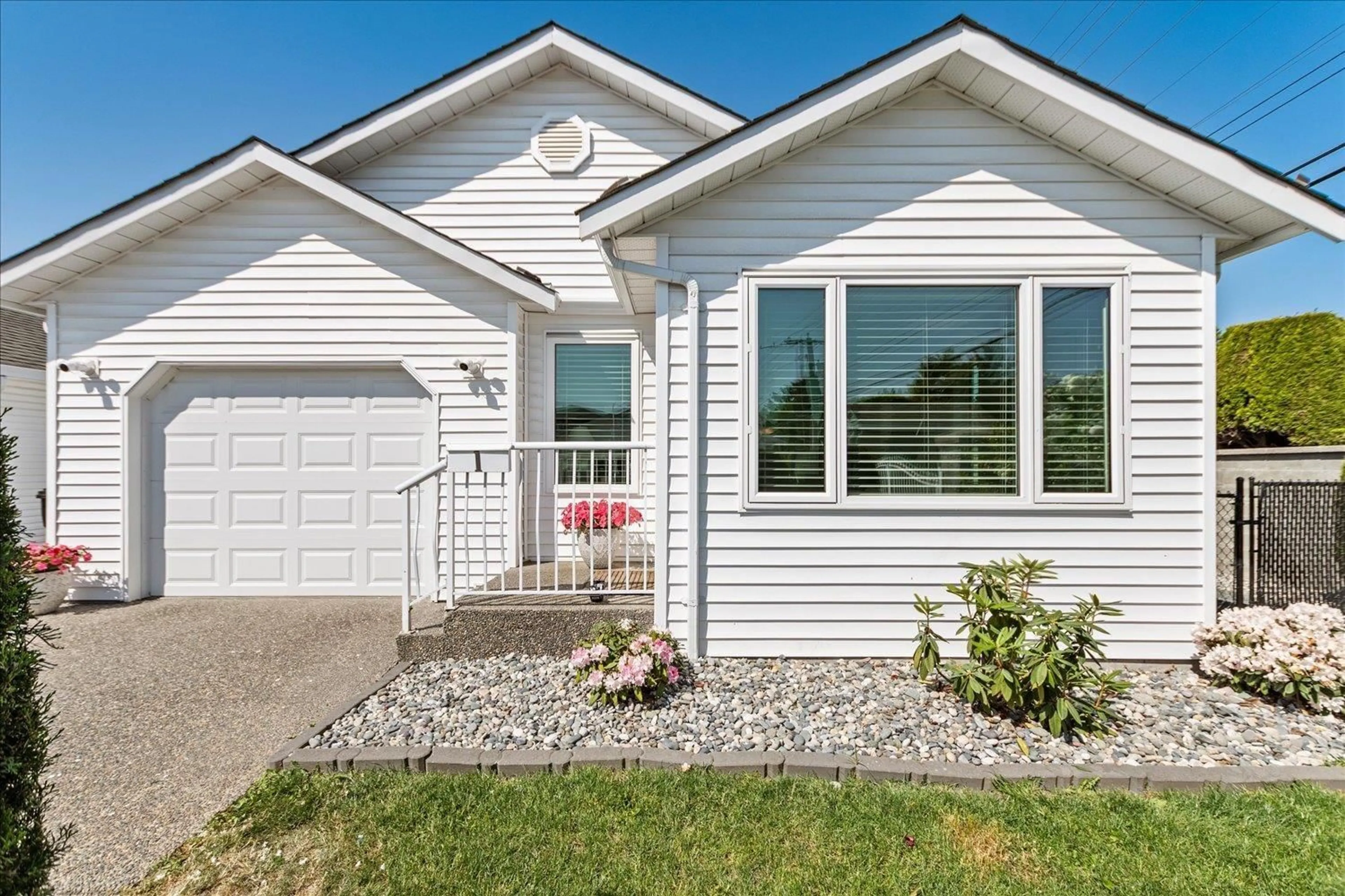 Home with vinyl exterior material, street for 1 - 46244 BROOKS AVENUE, Chilliwack British Columbia V2P1C4