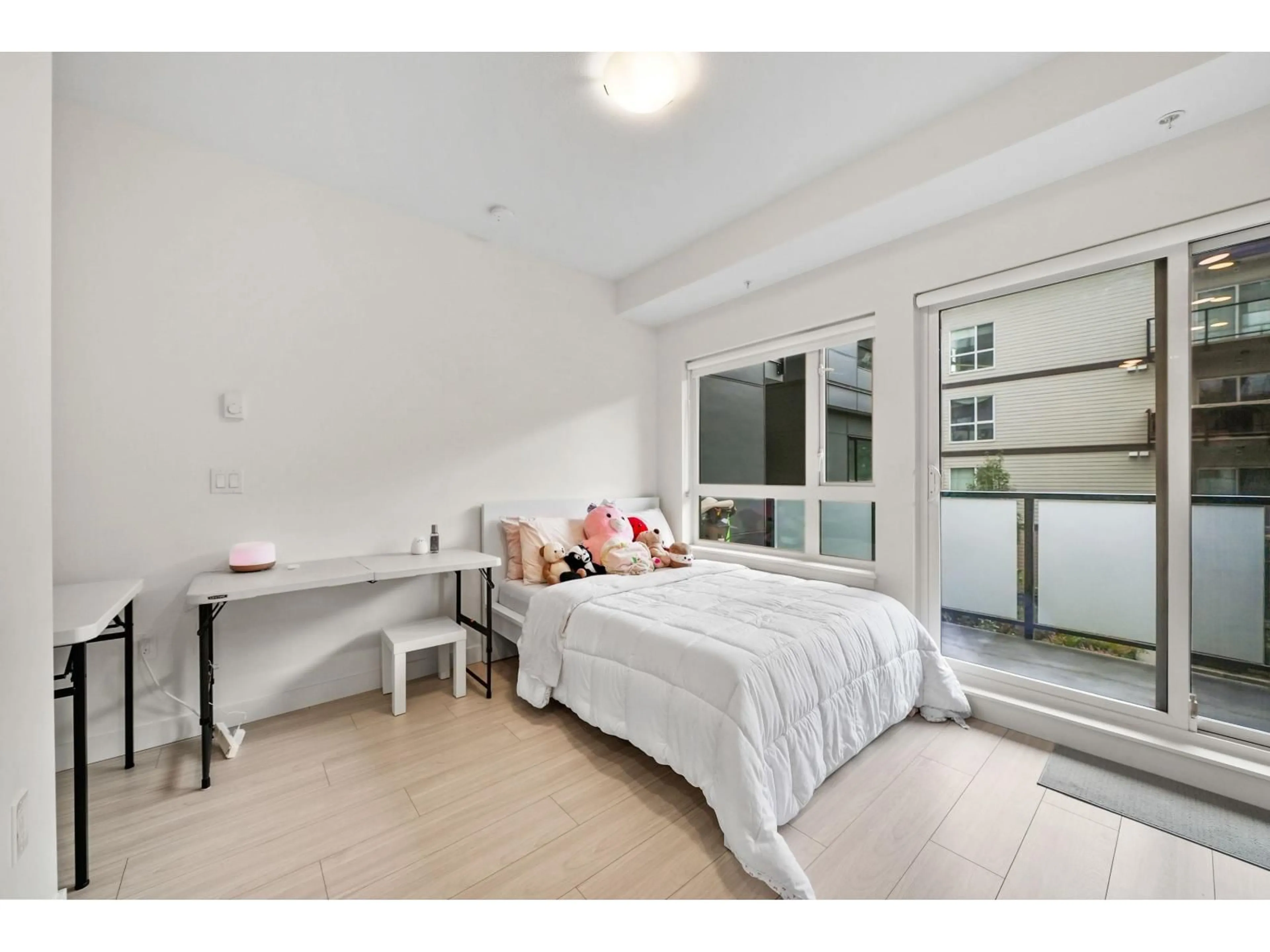 Bedroom with bed, unknown for 211 - 10777 138 STREET, Surrey British Columbia V3T0T5