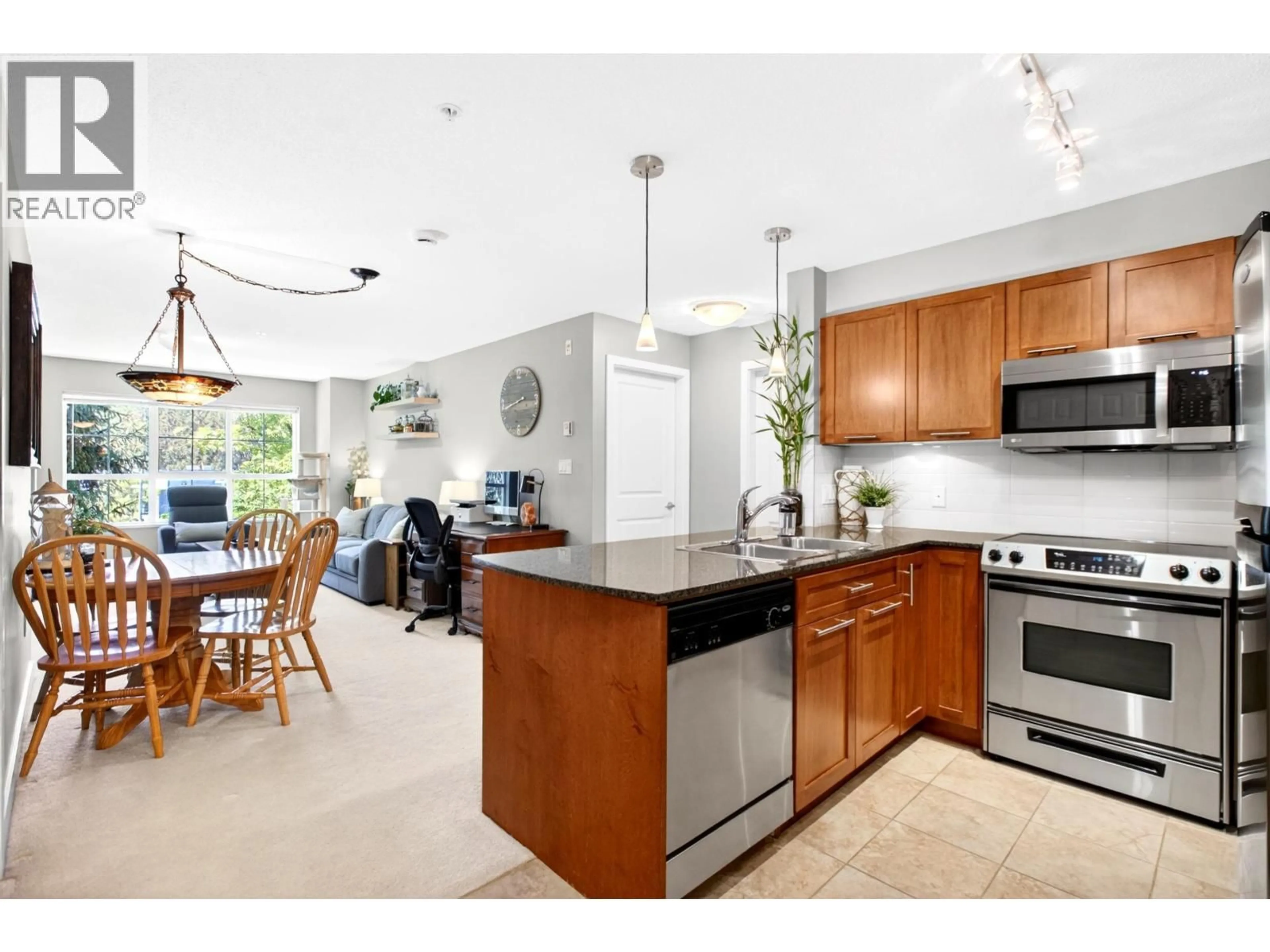 Open concept kitchen, ceramic/tile floor for 317 - 19673 MEADOW GARDENS WAY, Pitt Meadows British Columbia V3Y0A1