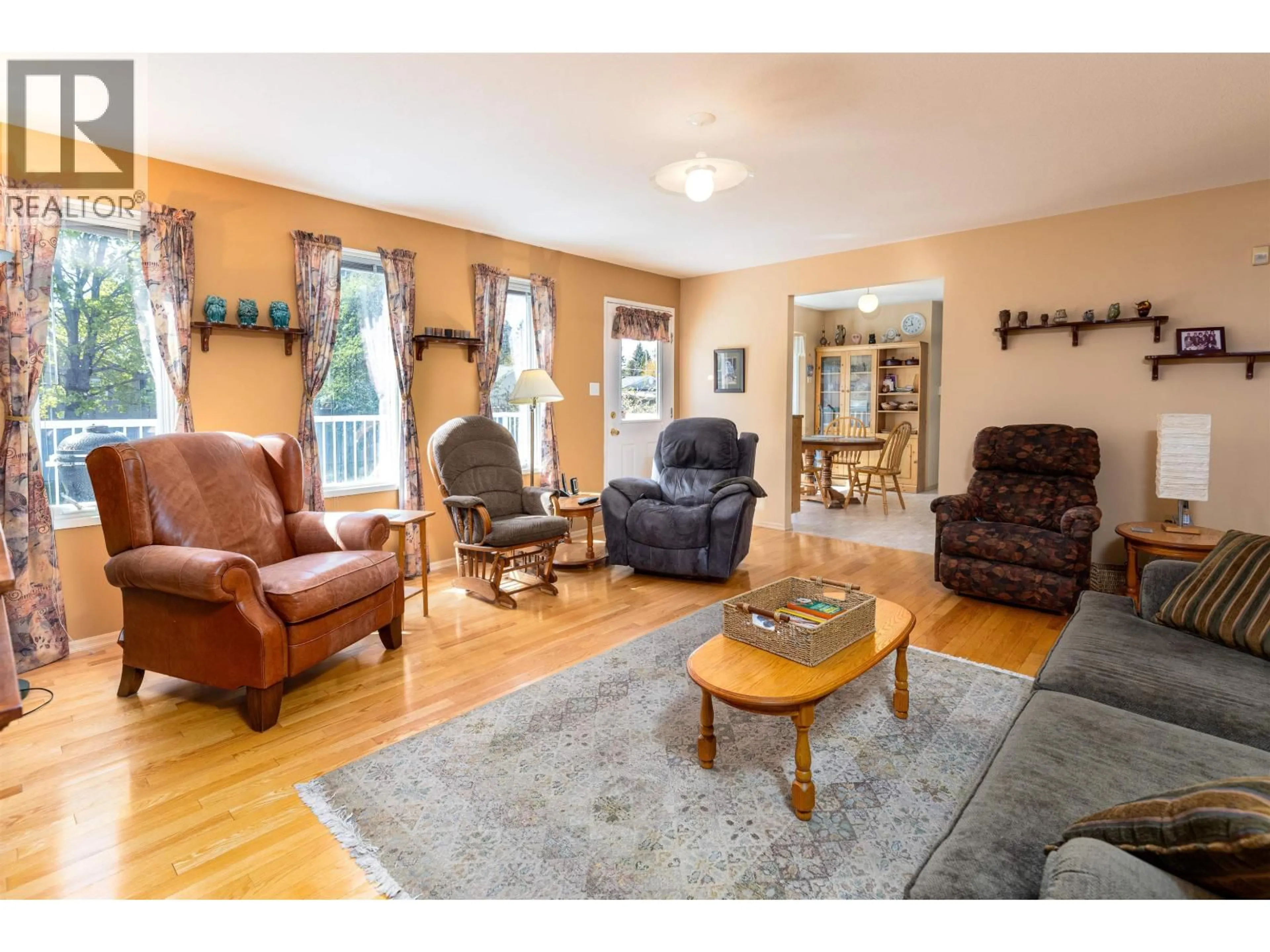 Living room with furniture, wood/laminate floor for 4737 SCOTT AVENUE, Terrace British Columbia V8G2B3