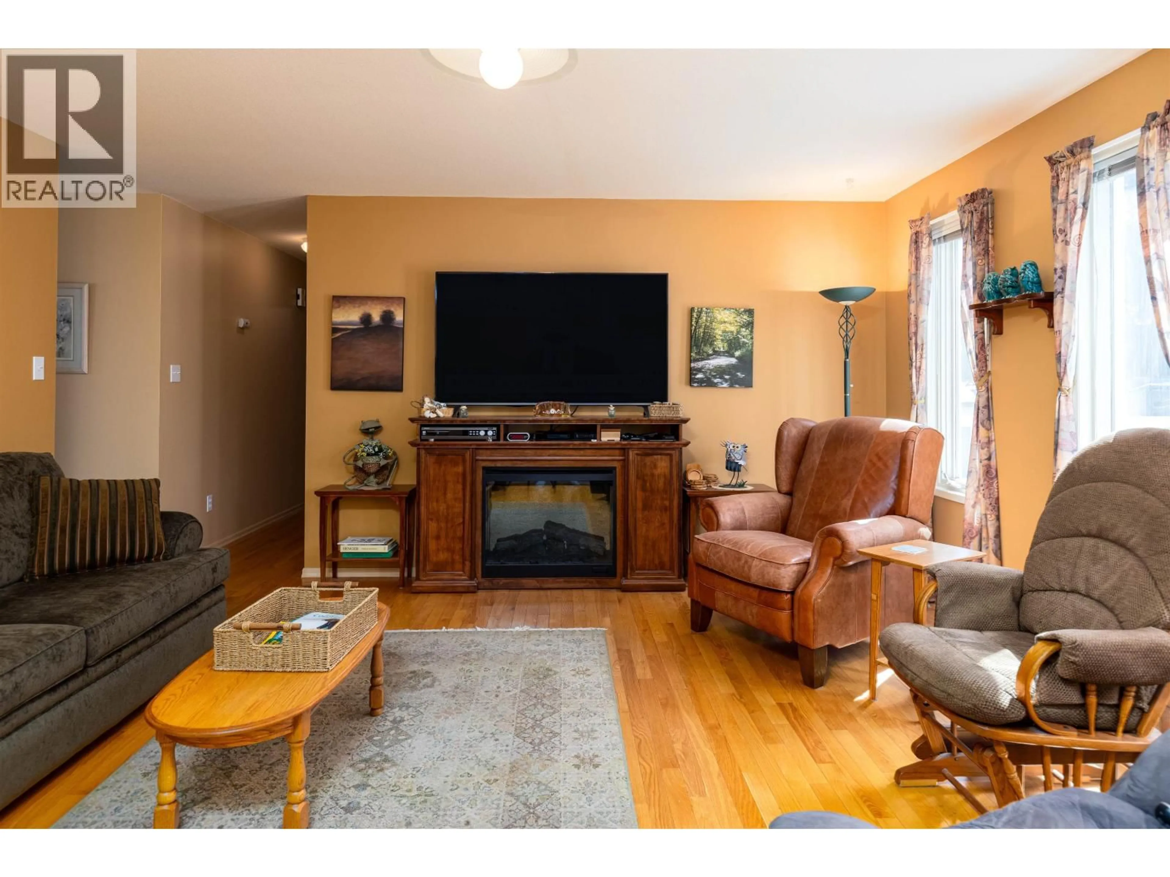 Living room with furniture, wood/laminate floor for 4737 SCOTT AVENUE, Terrace British Columbia V8G2B3