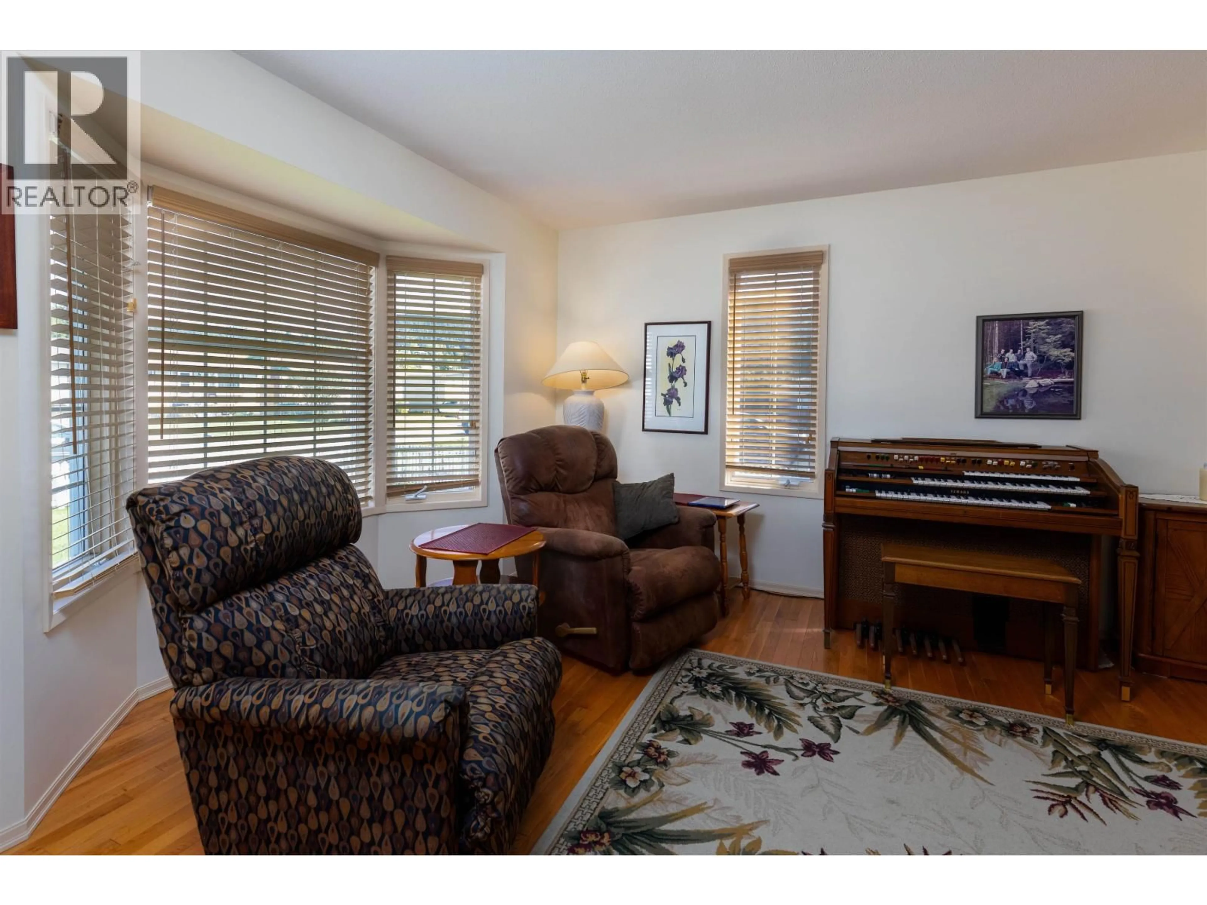 Living room with furniture, wood/laminate floor for 4737 SCOTT AVENUE, Terrace British Columbia V8G2B3