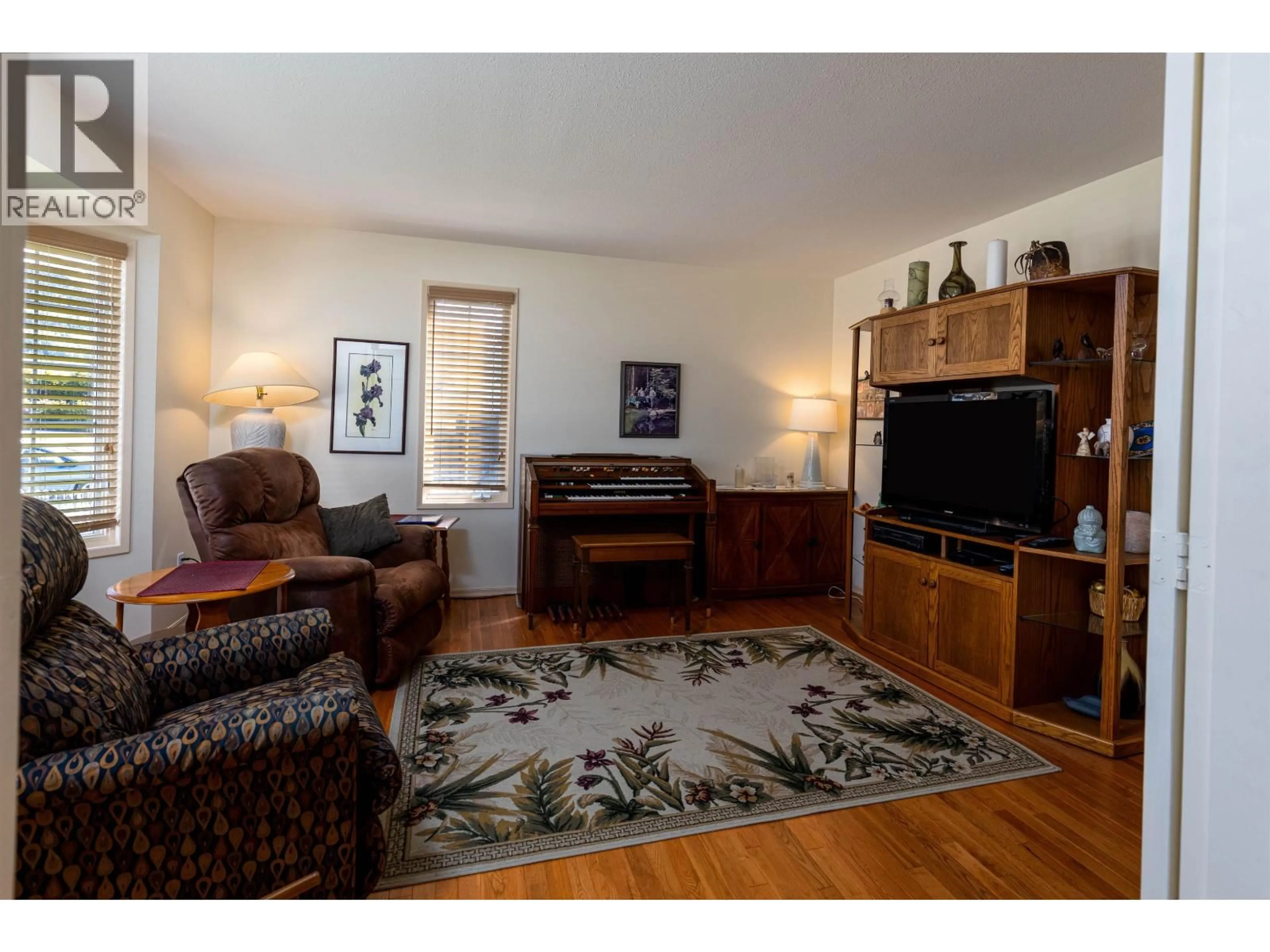 Living room with furniture, wood/laminate floor for 4737 SCOTT AVENUE, Terrace British Columbia V8G2B3