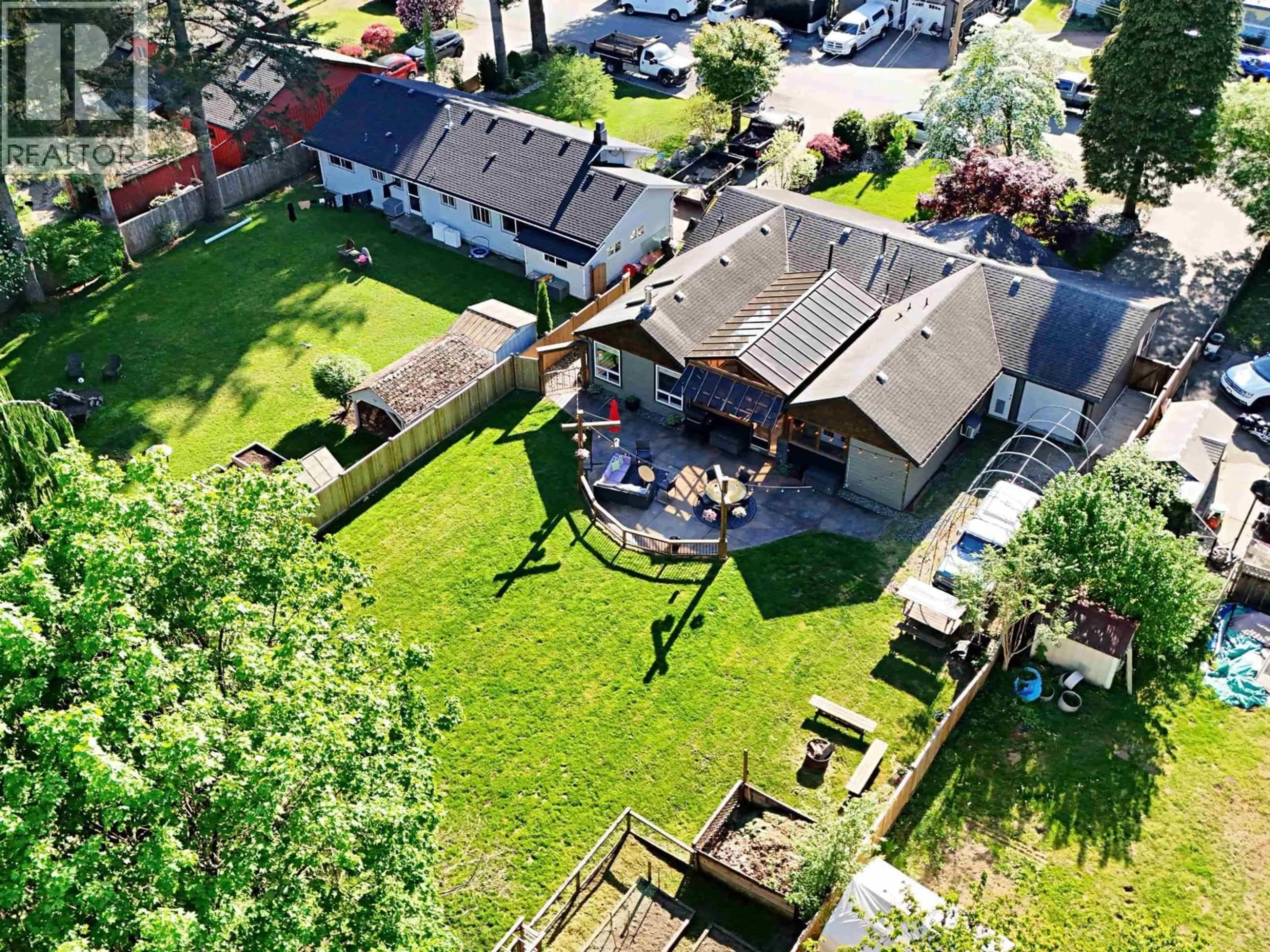 A pic from outside/outdoor area/front of a property/back of a property/a pic from drone, street for 12740 226 STREET, Maple Ridge British Columbia V2X6H7
