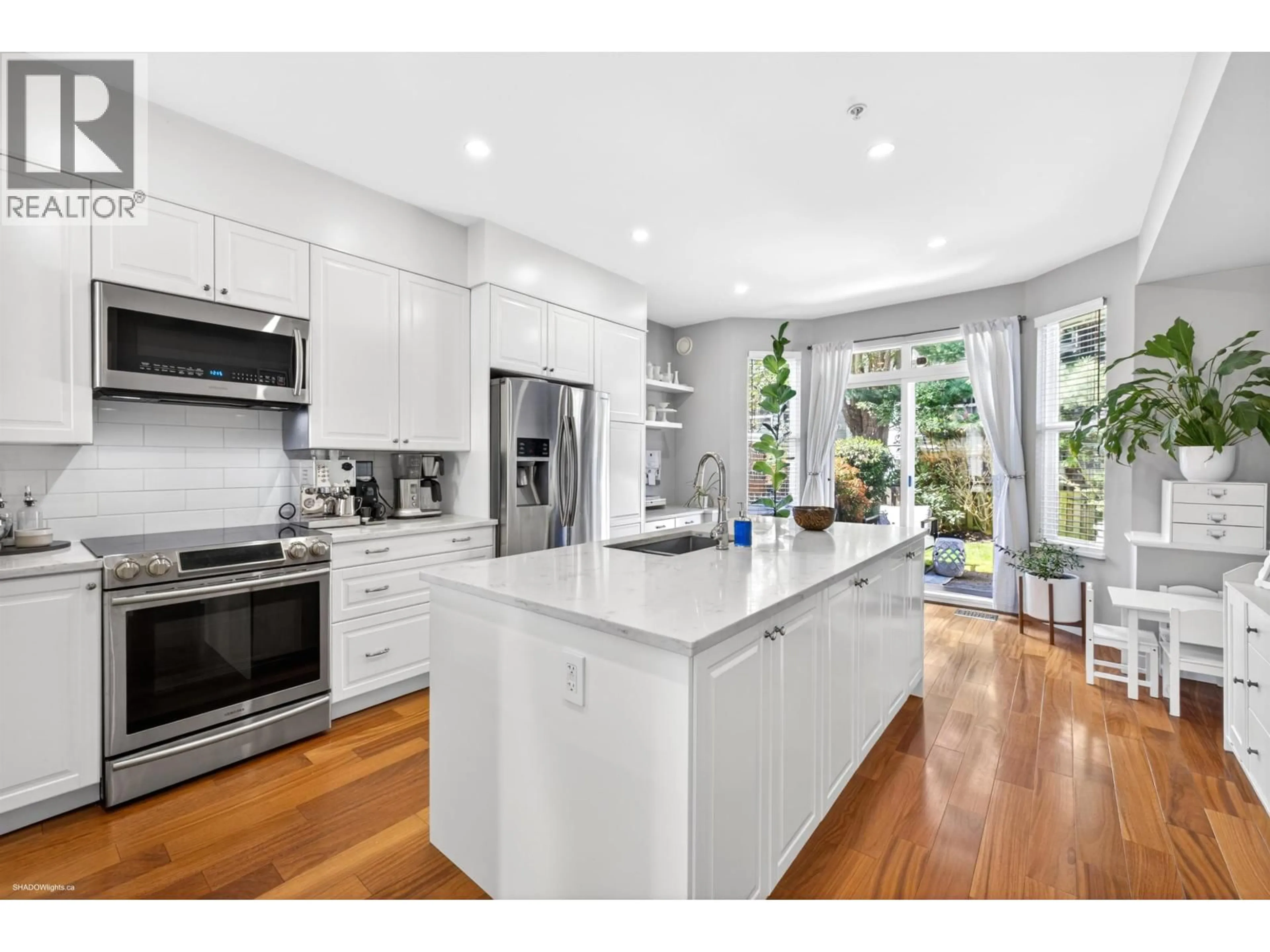 Open concept kitchen, unknown for 8527 AQUITANIA PLACE, Vancouver British Columbia V5S4V7