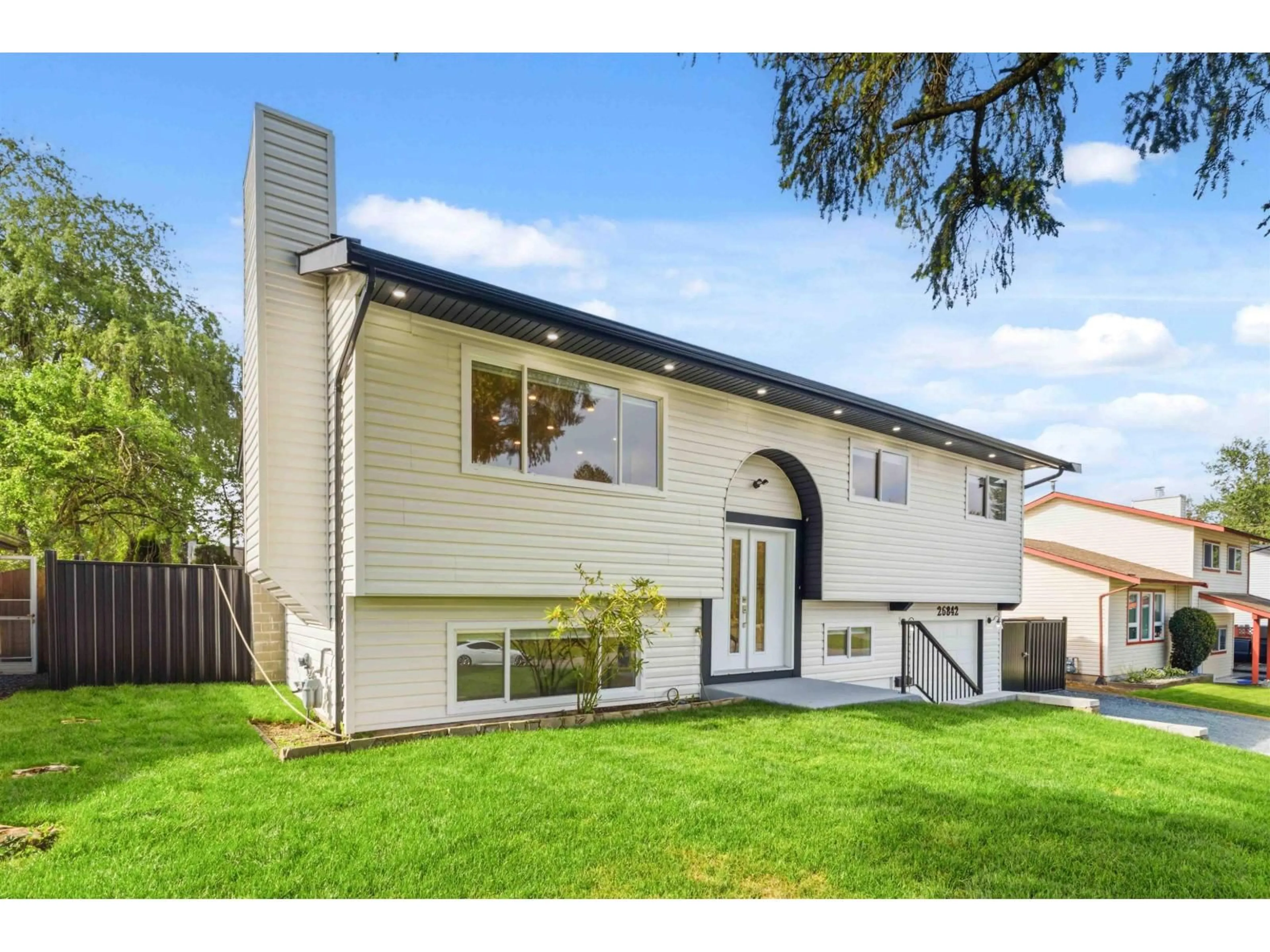 Home with vinyl exterior material, street for 26842 32A AVENUE, Langley British Columbia V4W3G4