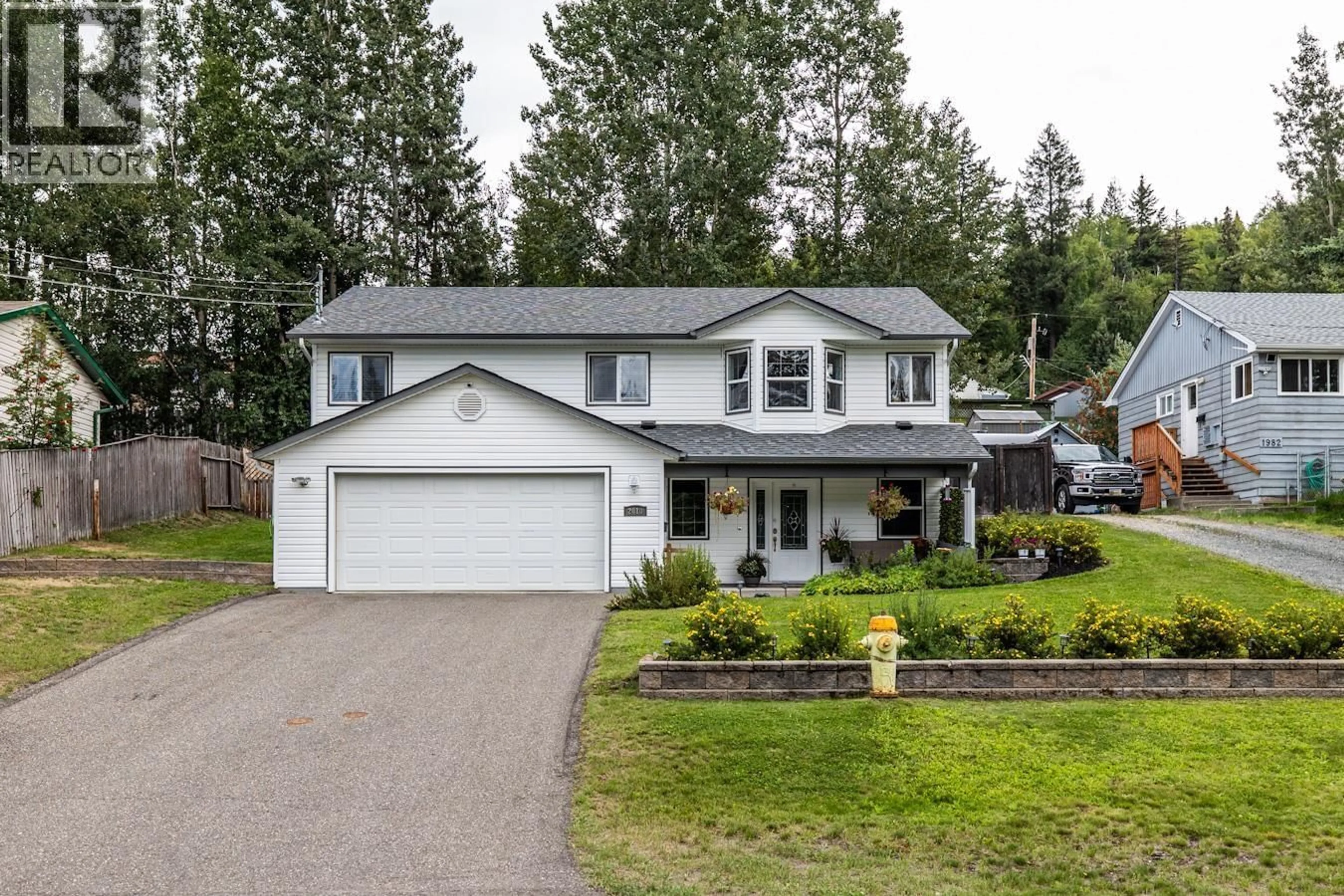 Home with vinyl exterior material, street for 2010 SKYLINE DRIVE, Prince George British Columbia V2K1J4