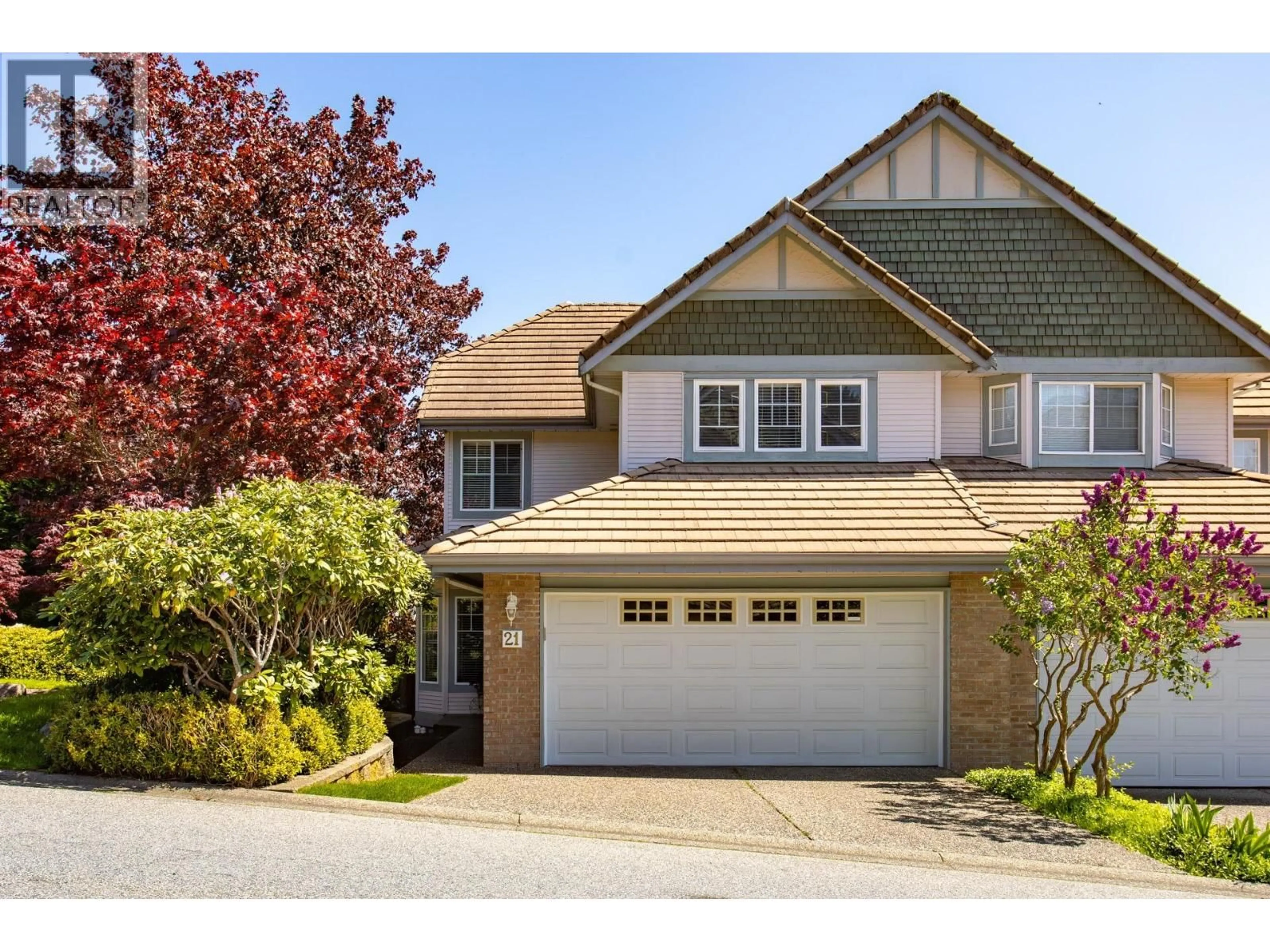 Home with vinyl exterior material, street for 21 - 1751 PADDOCK DRIVE, Coquitlam British Columbia V3E3M2