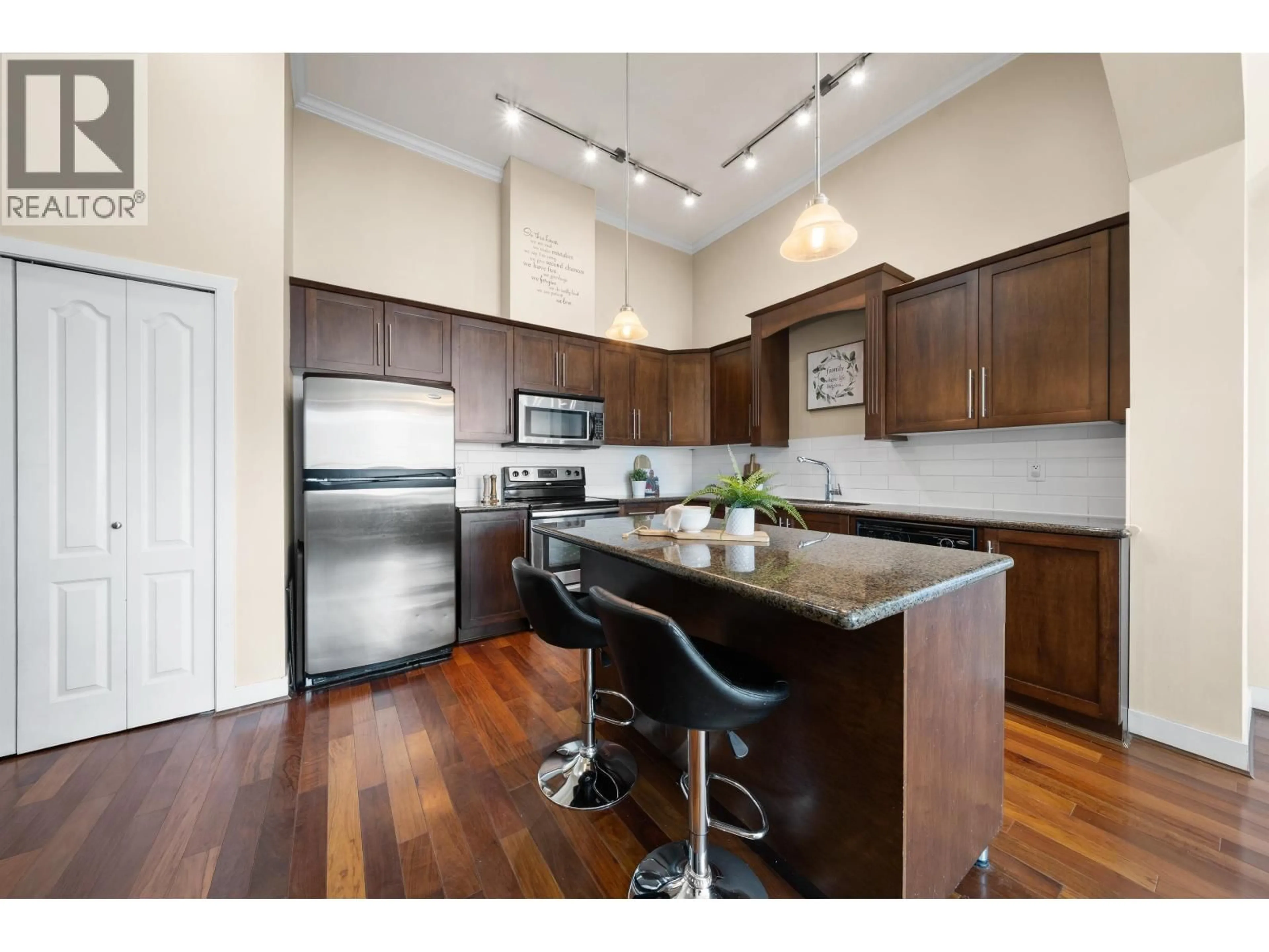 Open concept kitchen, wood/laminate floor for 415 - 2628 MAPLE STREET, Port Coquitlam British Columbia V3C0E2